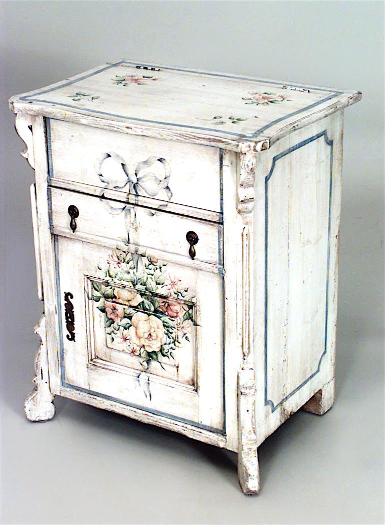 English Country (19/20th Century) painted bedside commode with floral design.
