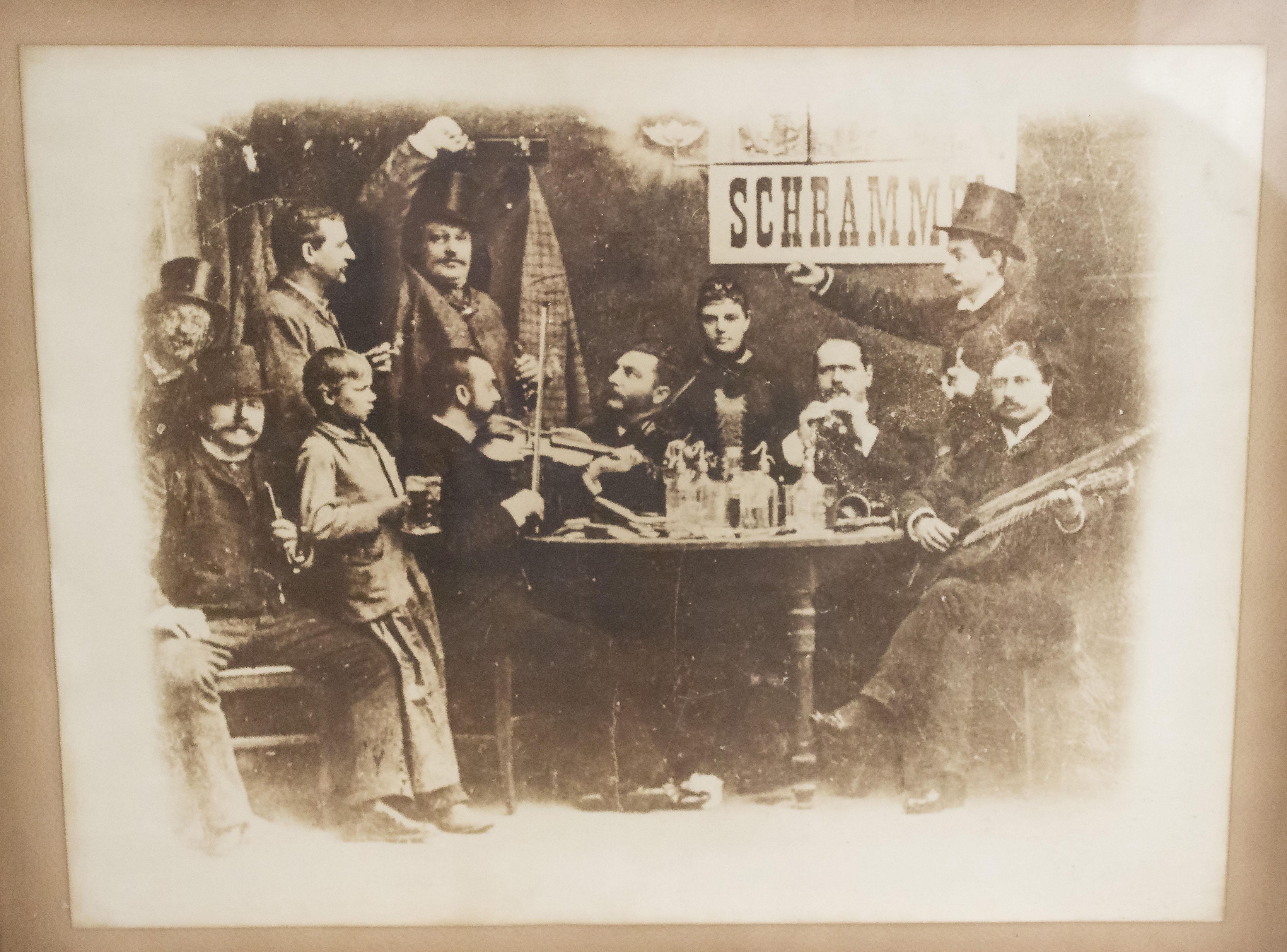 Walnut framed photograph of 19th Century genre scene of men drinking and playing musical instruments. (Companion Pieces: 052554B-E)