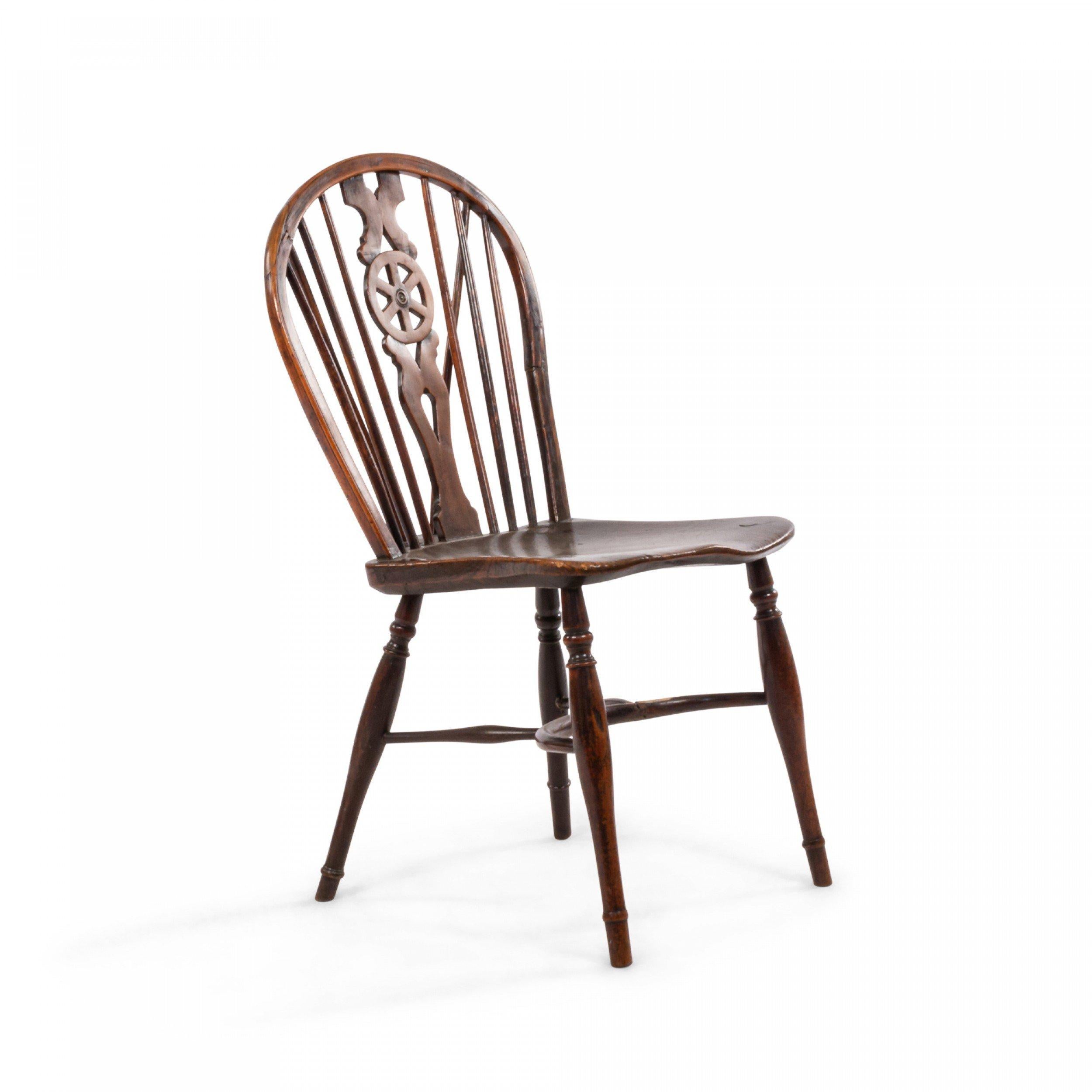 English Country (19th Cent) walnut Windsor side chair with wheel back.
 