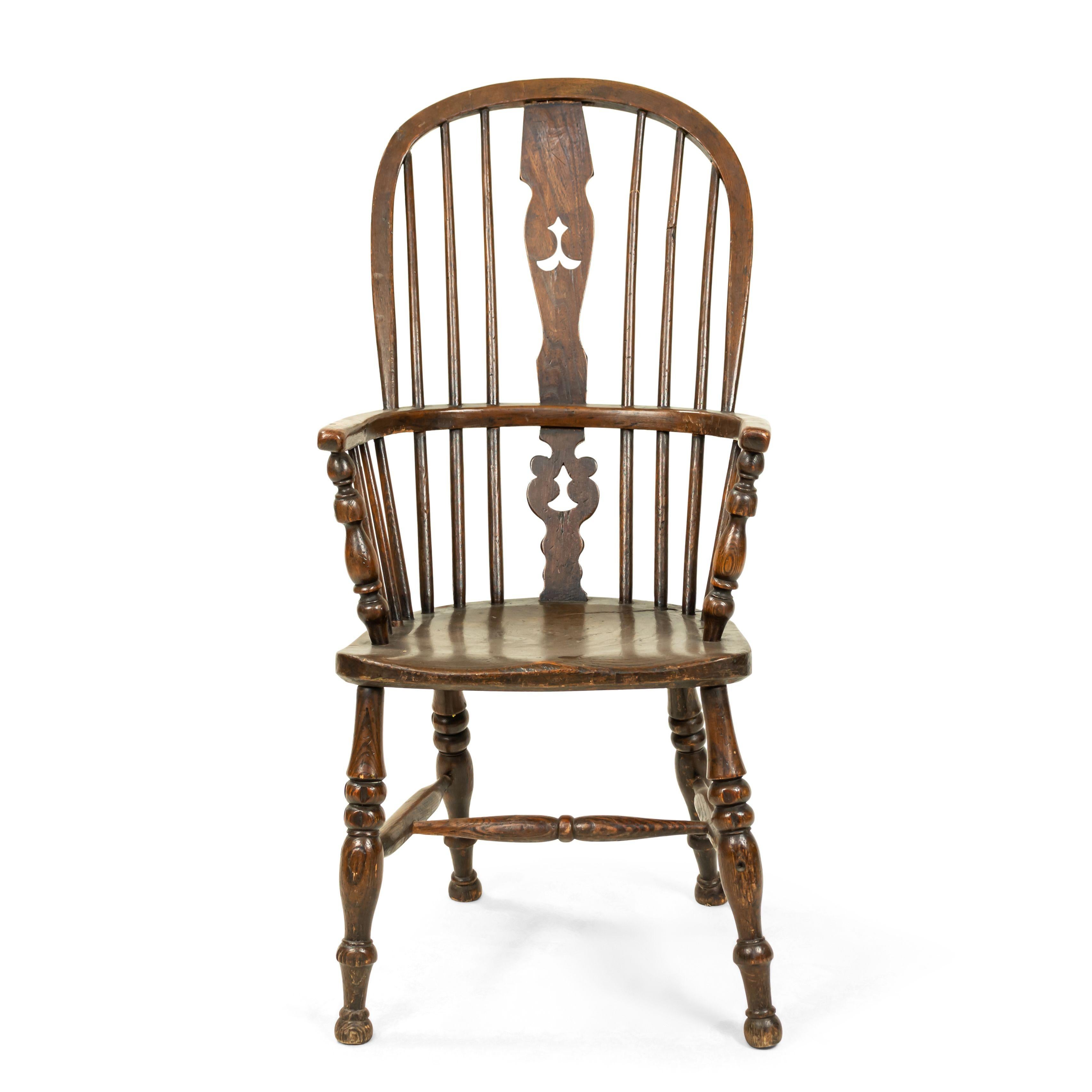 English country antique Windsor armchair with spindle and open splat back, (19th century).