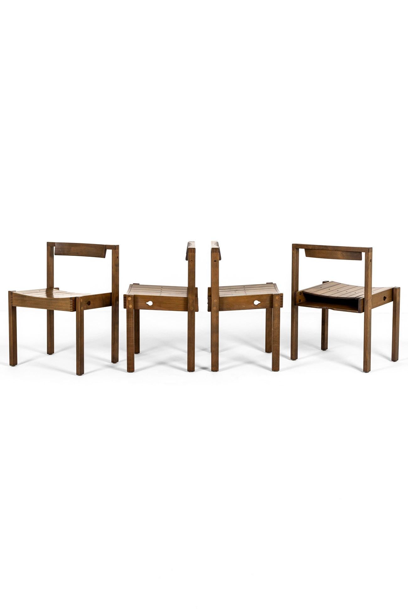 A good set of four oak stackable chairs for Coventry Cathedral.

In 1960 Scottish architect Sir Basil Spence commissioned Dick Russell to design a chair for the opening of the cathedral in 1962.

The now iconic post was design was very practical and