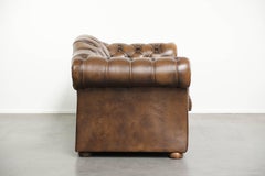English cowhide leather Chesterfield 2-seater sofa in a luxurious colour