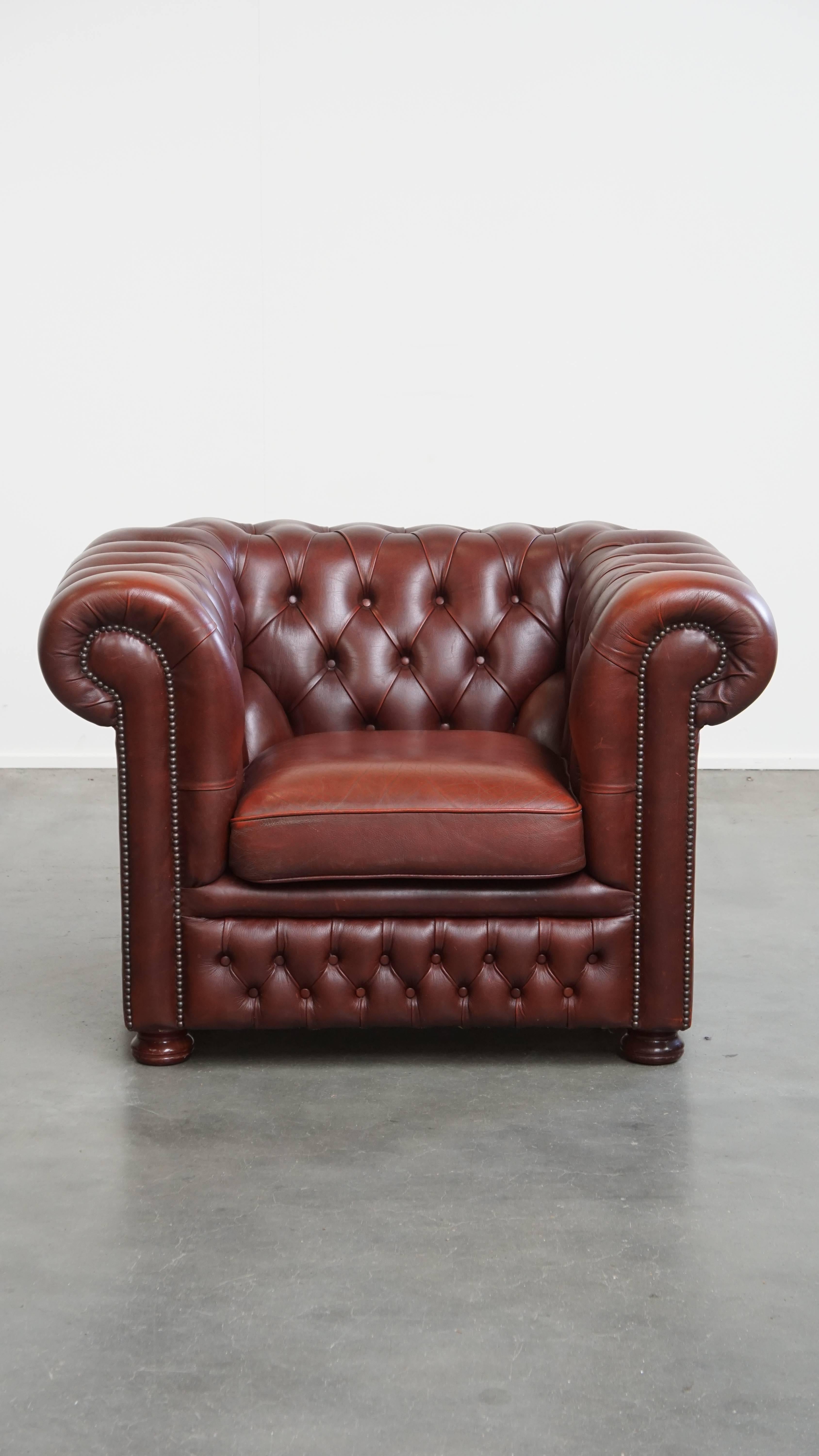 Nous vous proposons ce fauteuil Chesterfield en cuir anglais de Springvale à l'aspect luxueux. 

Ce fauteuil Chesterfield, fabriqué par la célèbre marque britannique Springvale, présente un design intemporel et classique, ce qui permet de l'intégrer