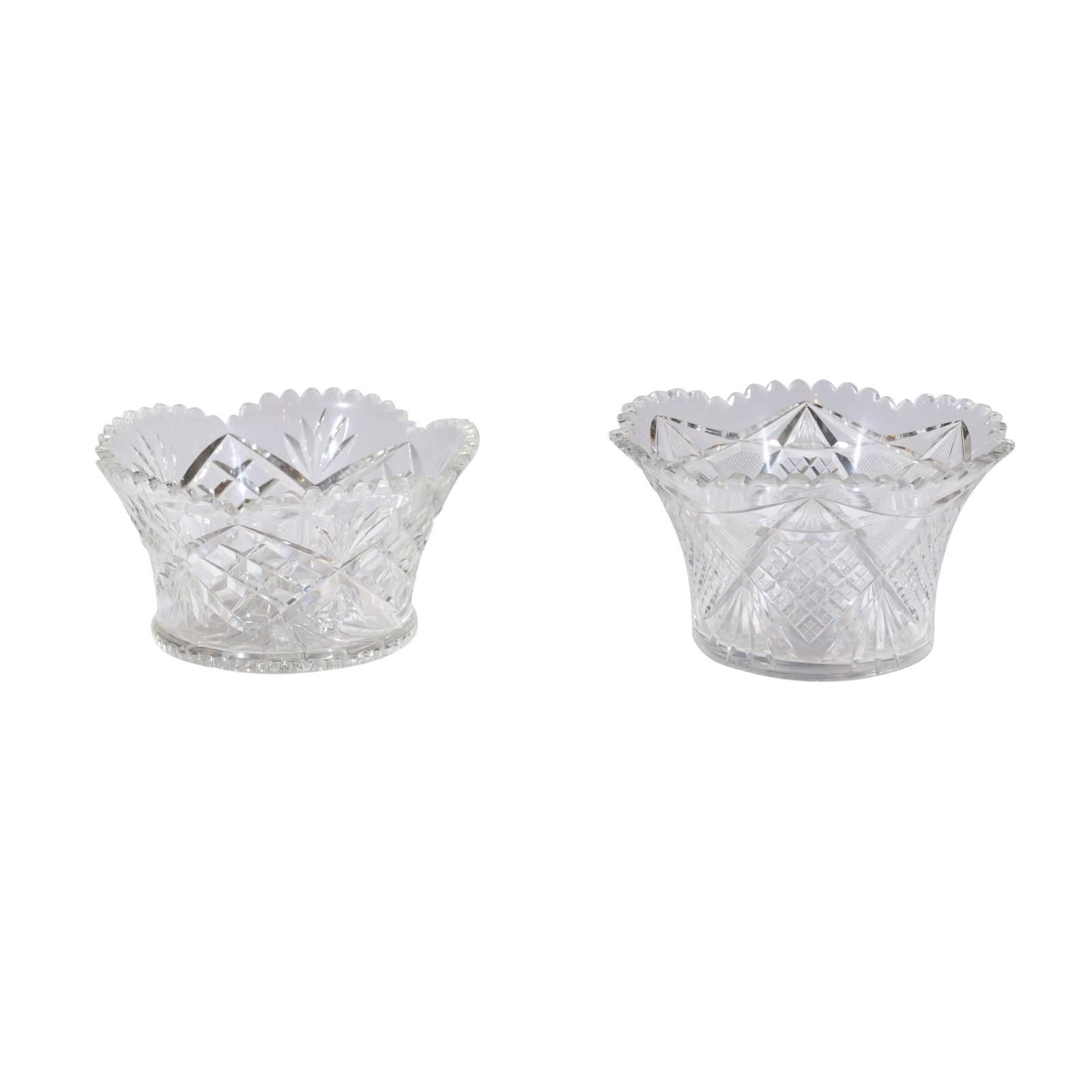 Two English turn of the century cut crystal bowls from the early 20th century, priced and sold individually. Born in the early years of the 20th century at the beginning of the reign of King Edward VII, each of these two crystal bowls features a
