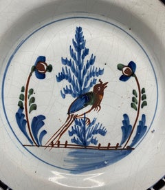 English Delft pancake plate, Long tailed bird, London, c. 1750.