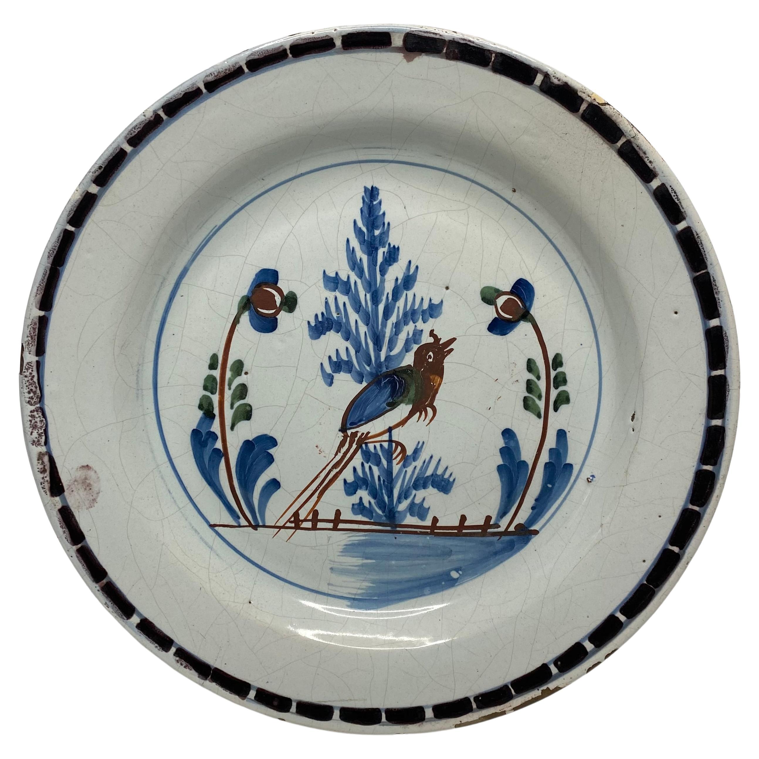 English Delft pancake plate, Long tailed bird, London, c. 1750. For Sale