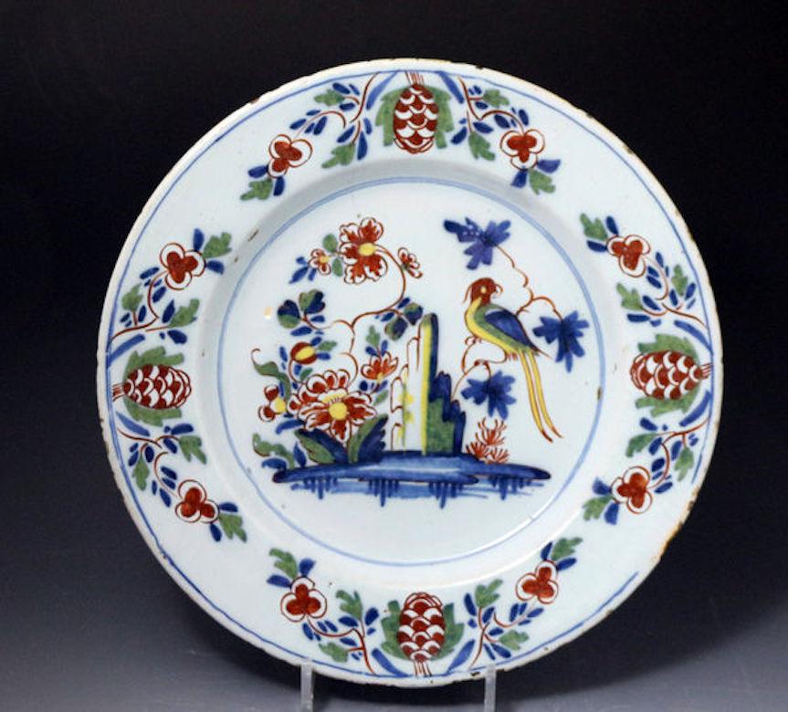 English Delftware Chargers with Parrot, Flowers Rock in Polychrome In Good Condition For Sale In Woodstock, OXFORDSHIRE