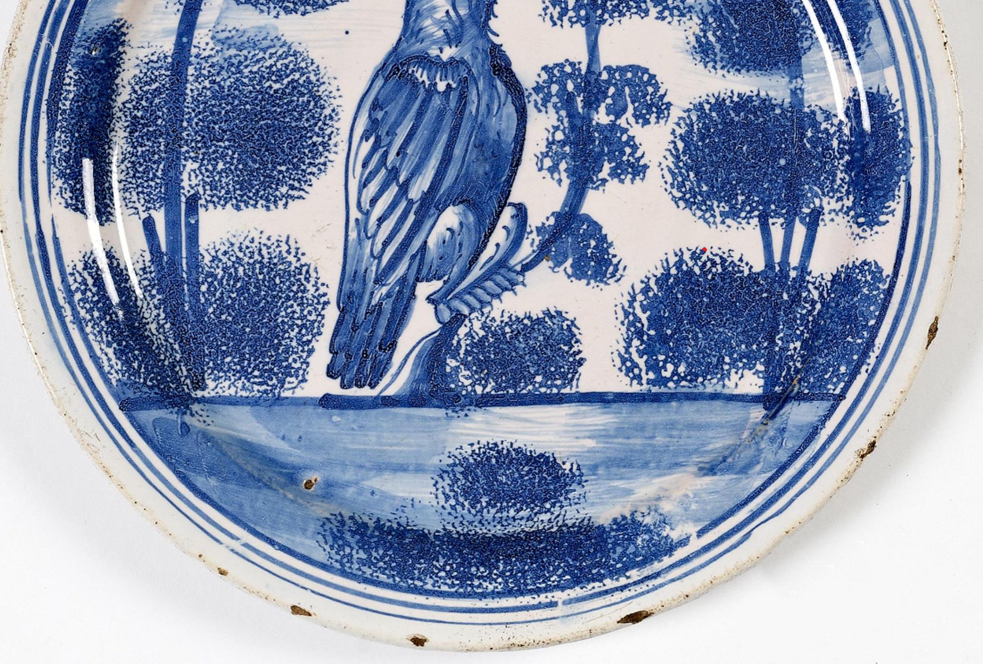 English Delftware Plate with Hawk Perched on Tree, London, Probably Vauxhall In Good Condition In Downingtown, PA