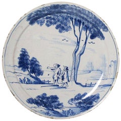English Delftware Plate with Scene of Two Figures in a Rural Landscape, 1740