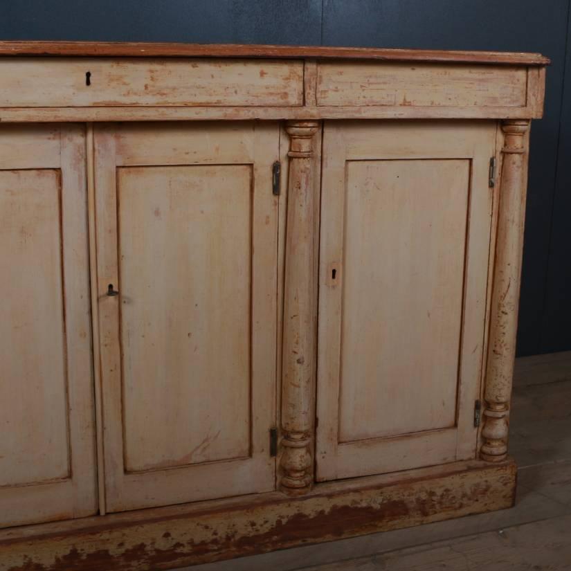 Early 19th century original painted English dresser base, 1820.

Dimensions:
65 inches (165 cms) wide
17 inches (43 cms) deep
36 inches (91 cms) high.

 
