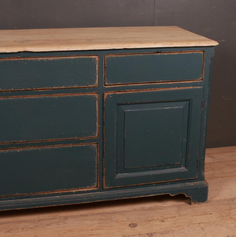 Early 19th century painted English dresser base with a pale scrubbed pine top - all the drawers work. Awaiting brass handles, 1820

Dimensions:
70.5 inches (179 cms) wide
22 inches (56 cms) deep
32 inches (81 cms) high.

 