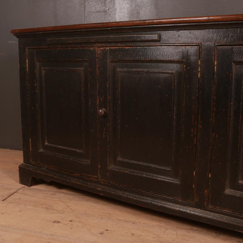 19th century English 4 door dresser base with 2 slides, 1840.


Dimensions:
86.5 inches (220 cms) wide
17 inches (43 cms) deep
35 inches (89 cms) high.
 