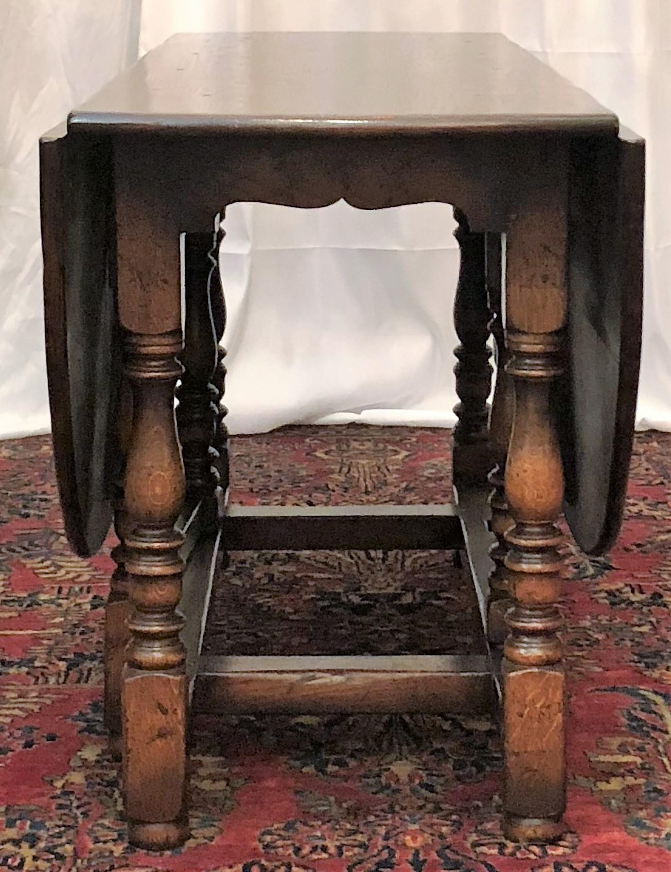 Contemporary English Drop-Leaf Yew Wood Round Table