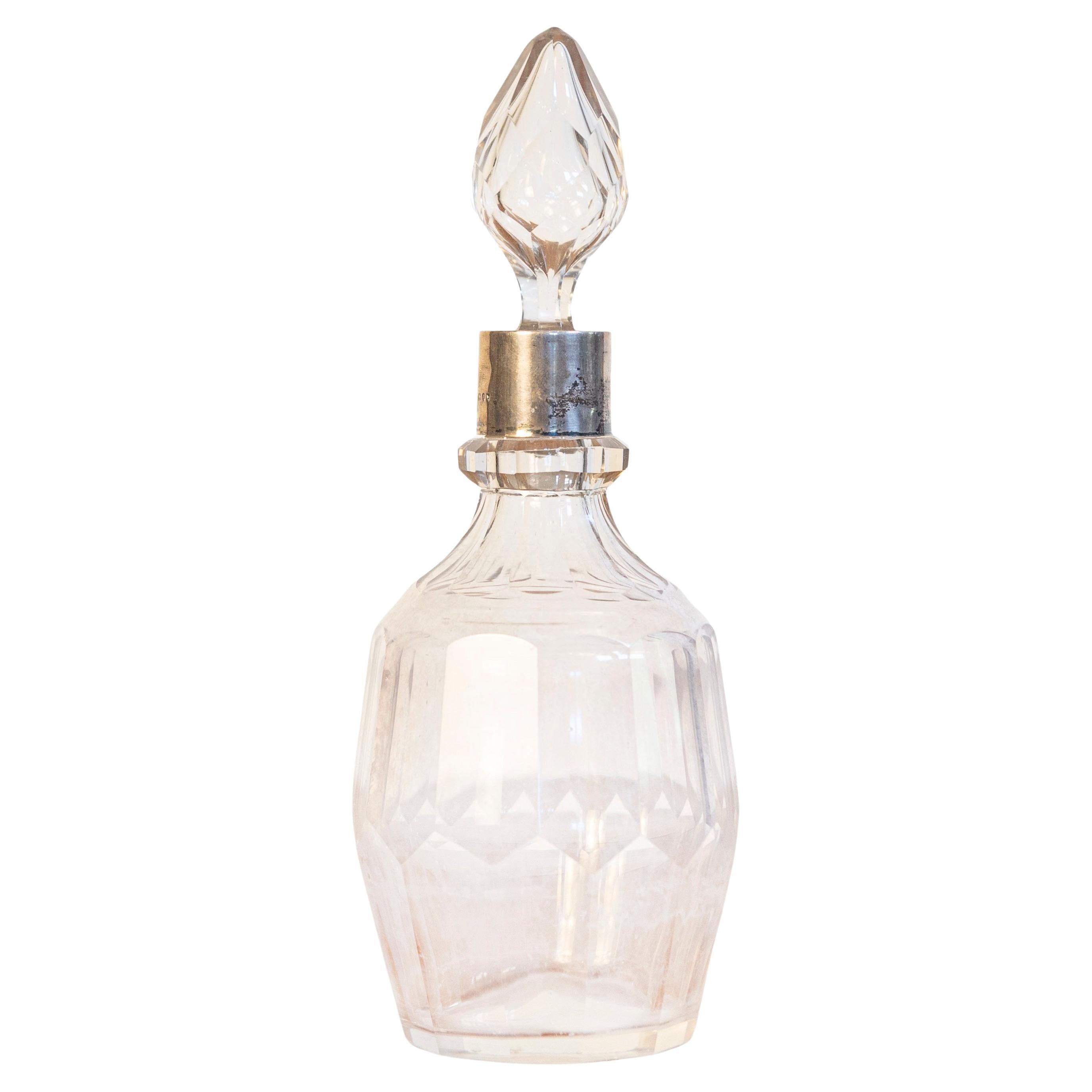 English Early 19th Century Crystal Toiletry Bottle with Stopper and Silver Neck