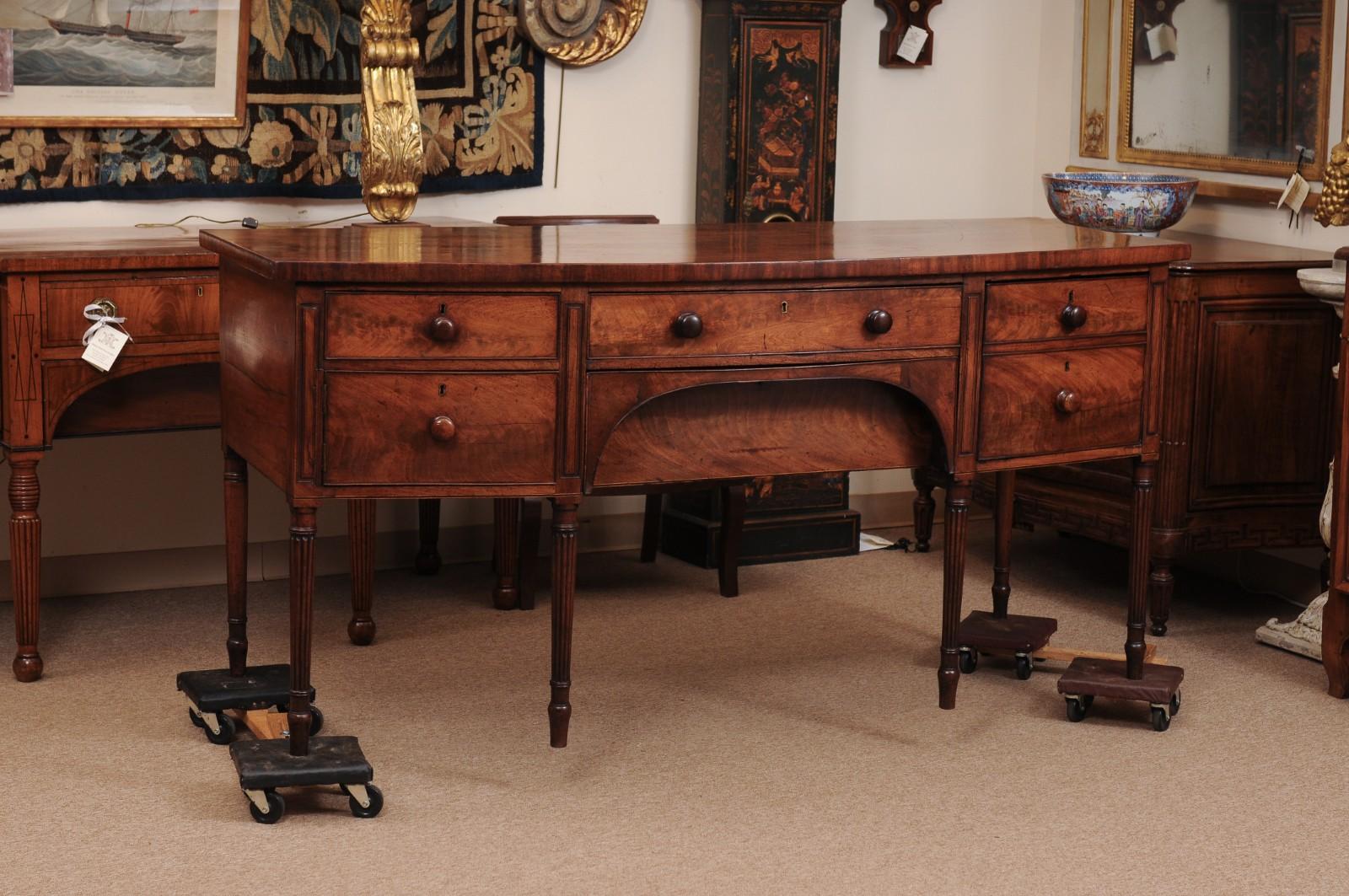 English Early 19th Century Mahogany Bow Front Sideboard with Reeded Legs In Fair Condition For Sale In Atlanta, GA