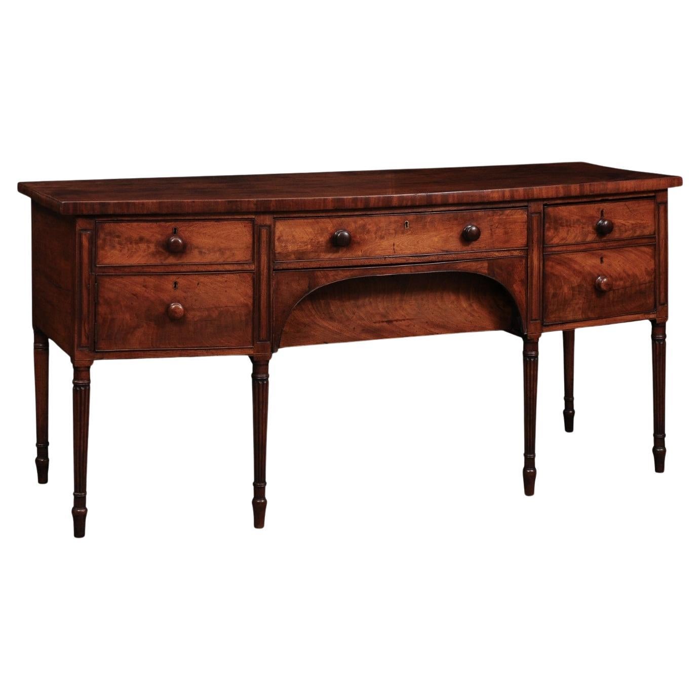English Early 19th Century Mahogany Bow Front Sideboard with Reeded Legs