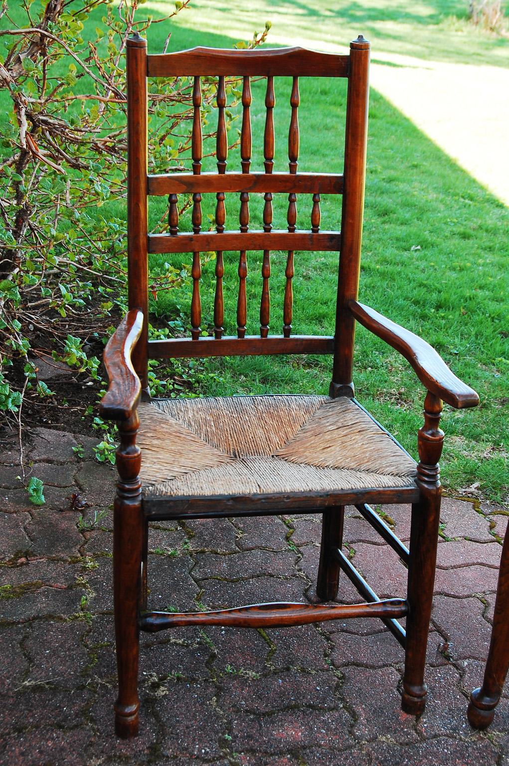 Country English Early 19th Century Matched Pair of Spindleback Armchairs in Elm For Sale