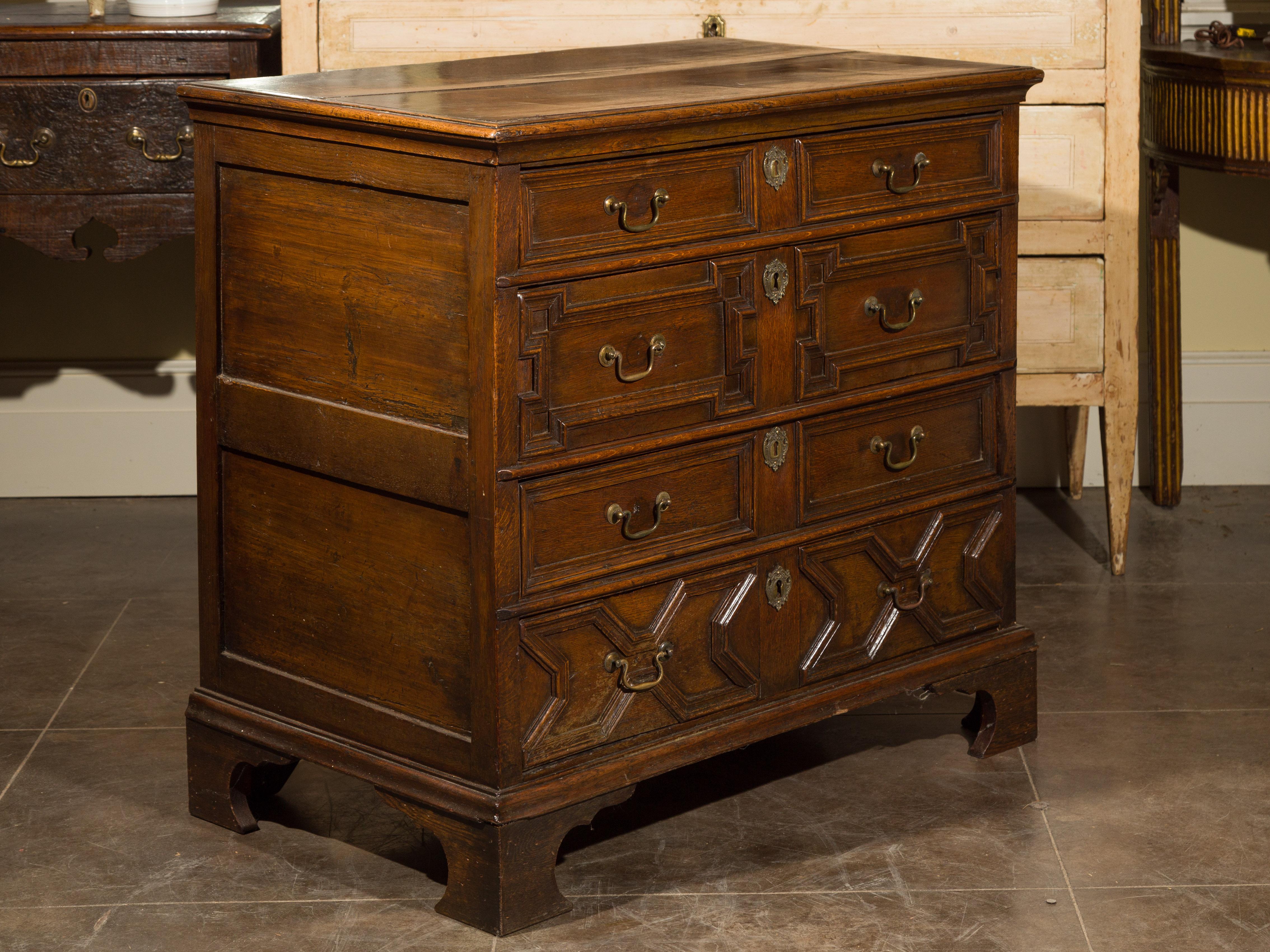 Georgian English Early 19th Century Oak Geometric Front Four-Drawer Chest on Bracket Feet For Sale