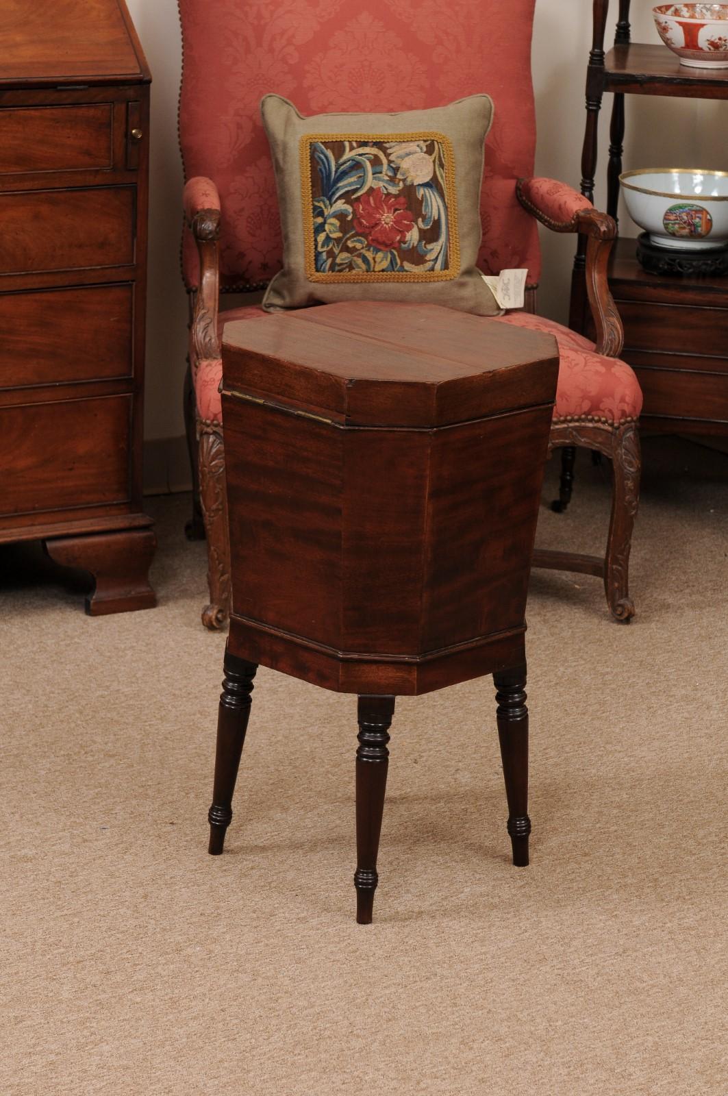 English Early 19th Century Regency Mahogany Cellarette with Octagonal Form Top & Turned Legs