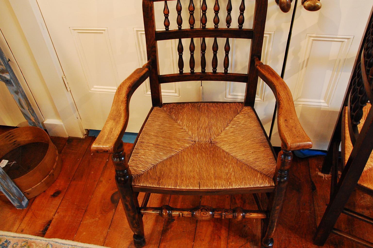 English Early 19th Century Set of Eight Spindleback Dining Chairs with Two Arms 1