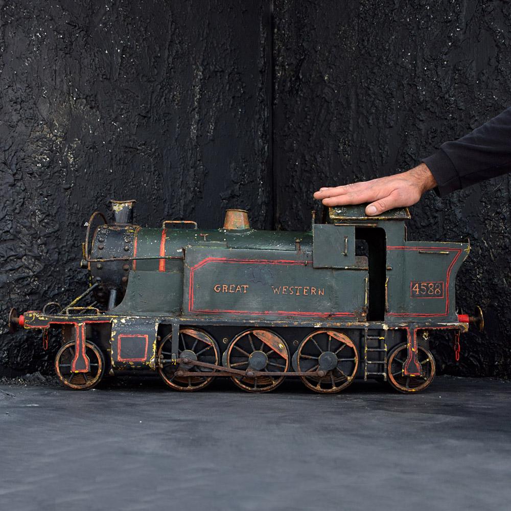 Amazing scratch built locomotive

We are proud to offer one of the best examples of English early 20th century scratch built Folk Art examples. Modelled on an English steam locomotive this item has been wonderfully constructed using metal sheets