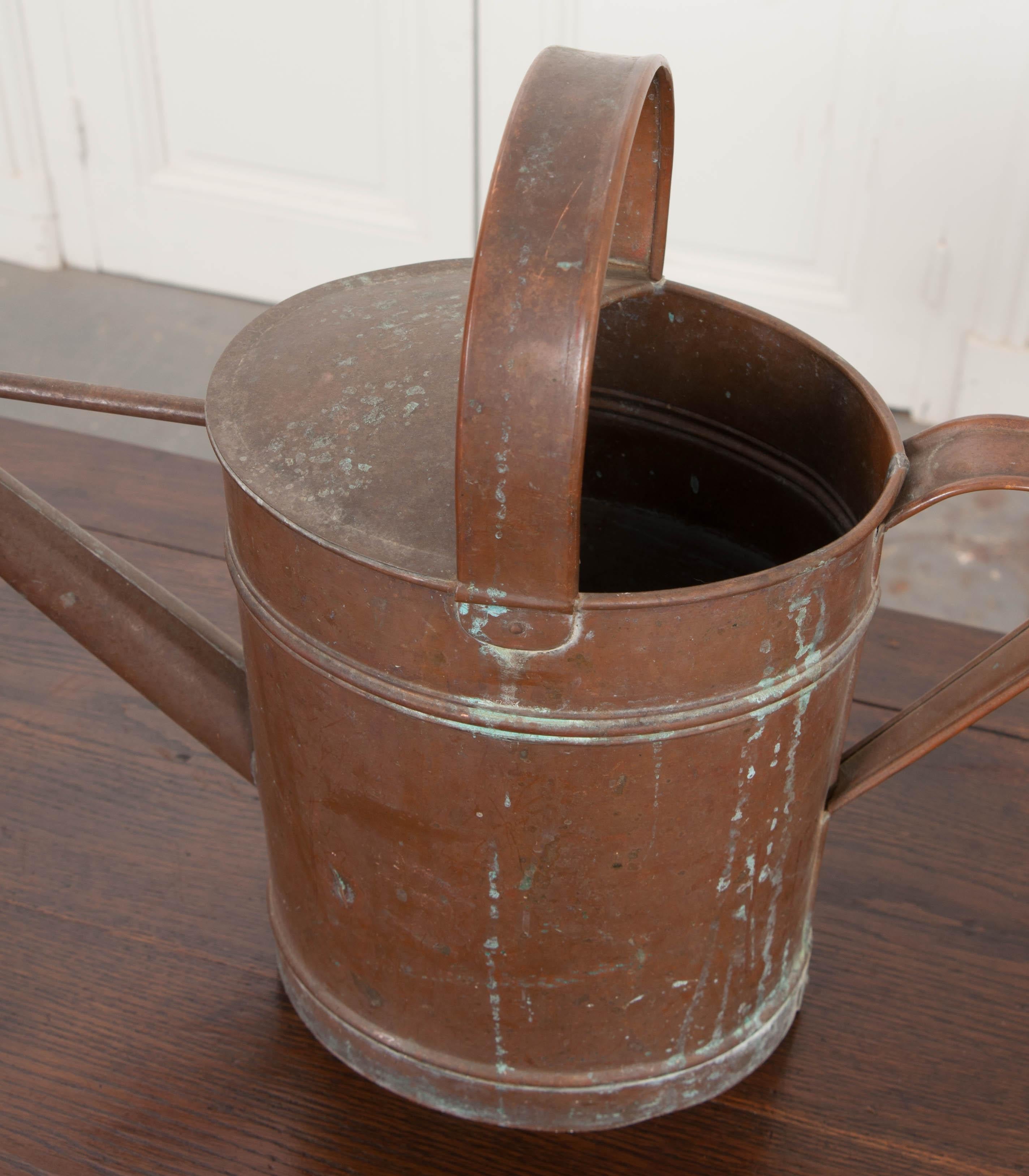 This delightful copper watering can, circa 1910s, is from England and will make tending to your garden very convenient!