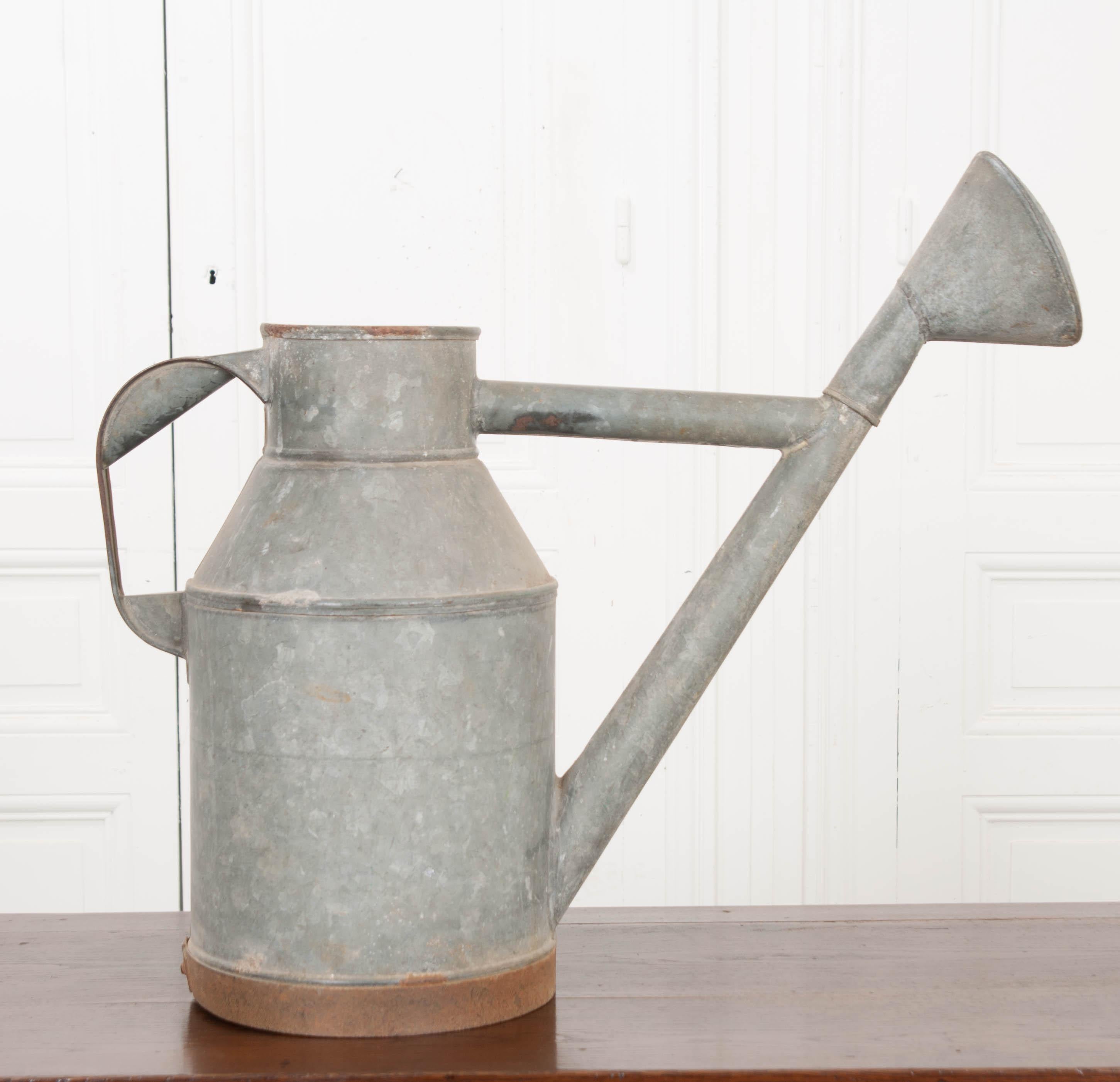 This charming zinc watering can, circa 1920s, is from England and will make tending to your garden very convenient!