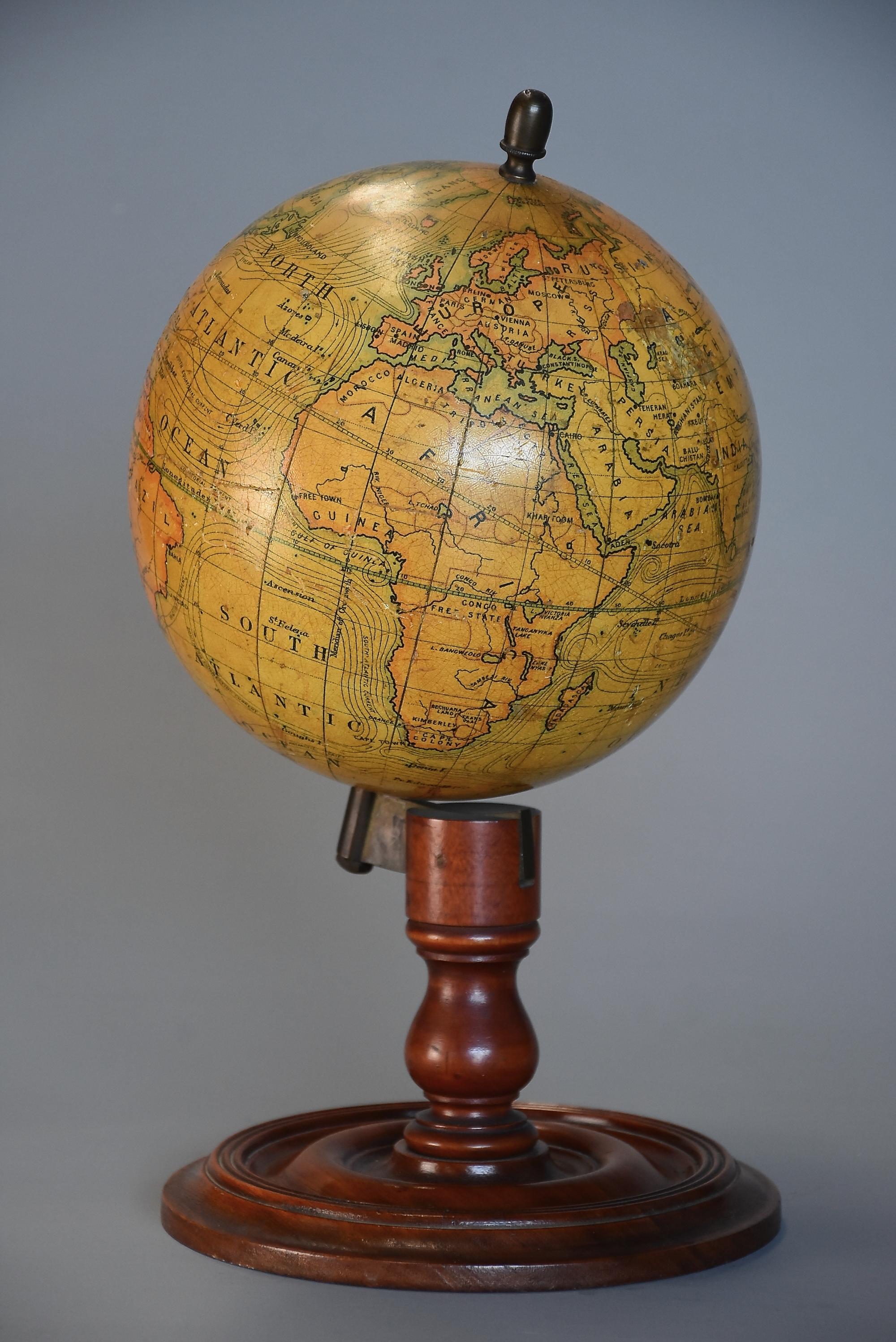 An early 20th century educational table globe by E.J. Arnold & Sons Ltd. Leeds.

This table globe is in good, original condition, the globe fully rotates and is supported on a turned mahogany base. 

This item is in good, original condition for