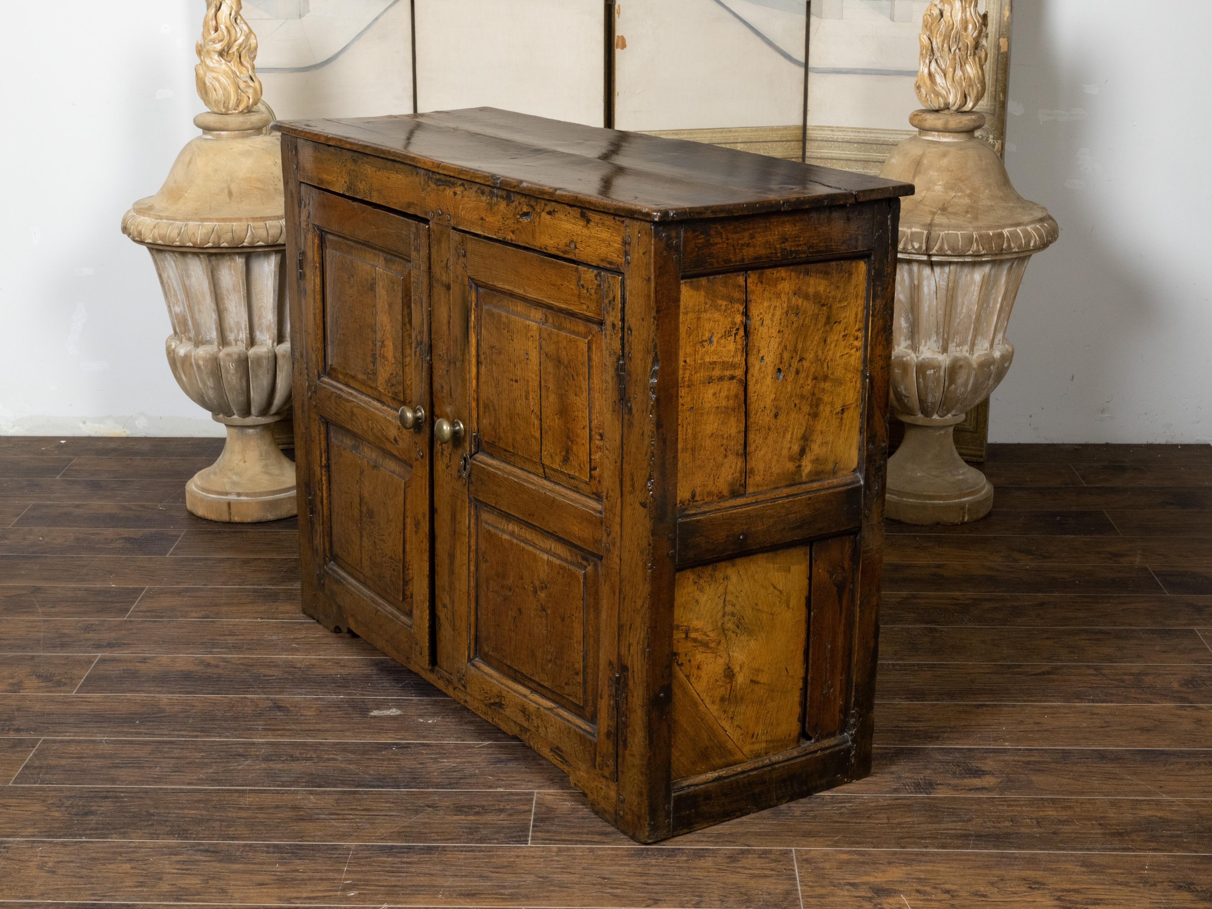 Carved English Early Oak Cupboard with Two Doors and Distressed Patina, 18th Century For Sale