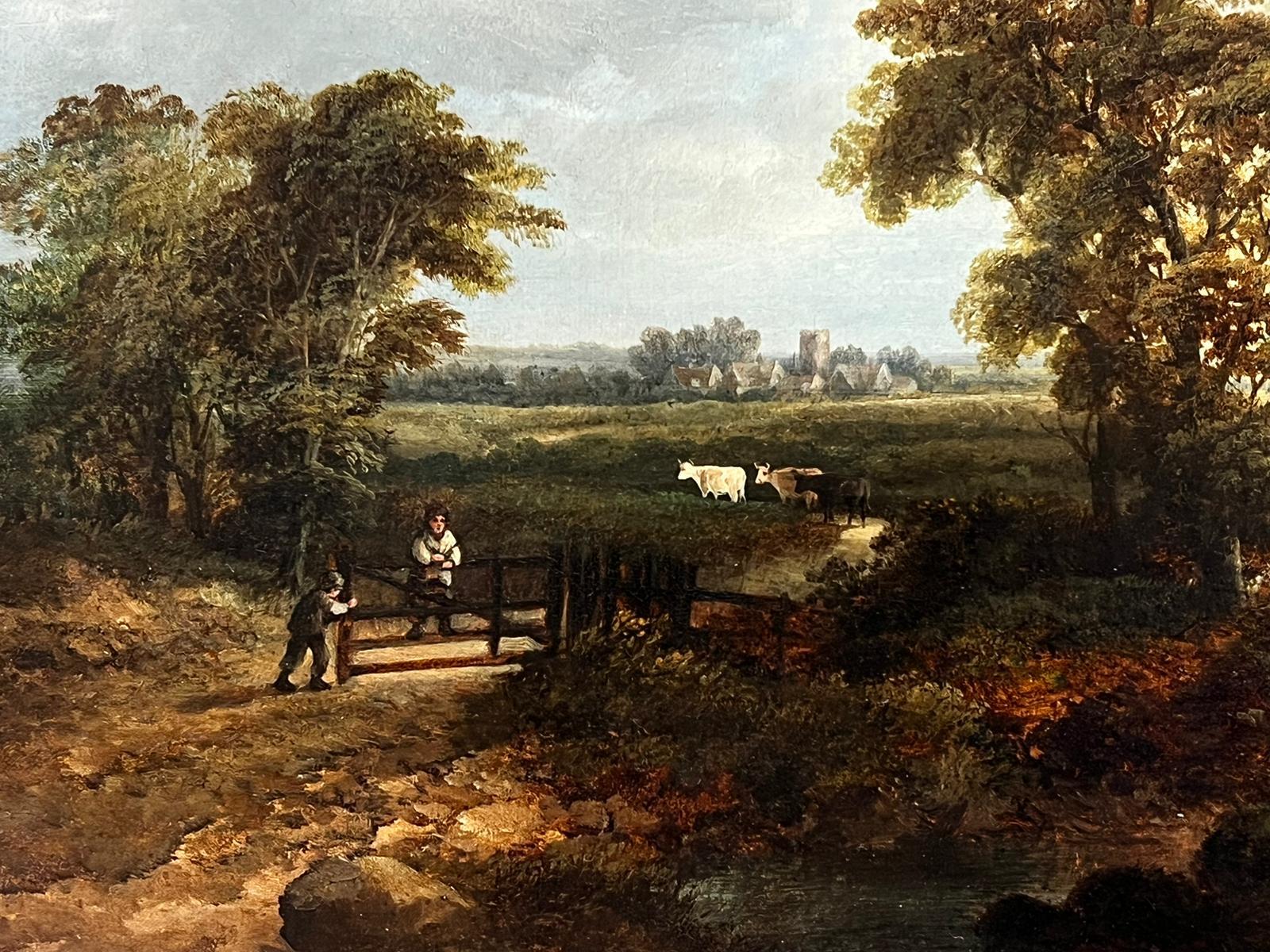 Artist/ School: English School, circa 1830's, typical of the 'Suffolk School' painters of the period. 

Title: Tranquil Rural Landscape, with figures on the country gate, cattle in pastures beyond and a church standing in the distance. 

Medium: oil