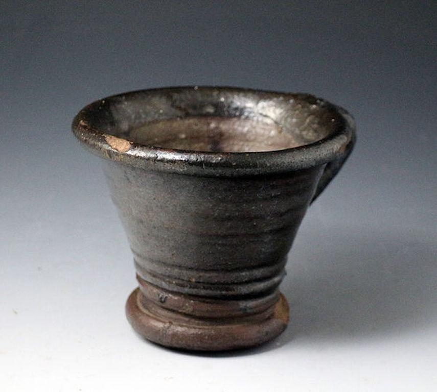 English Earthenware 17th Century Mortar the Handle with a Pinched Terminal In Good Condition For Sale In Woodstock, OXFORDSHIRE
