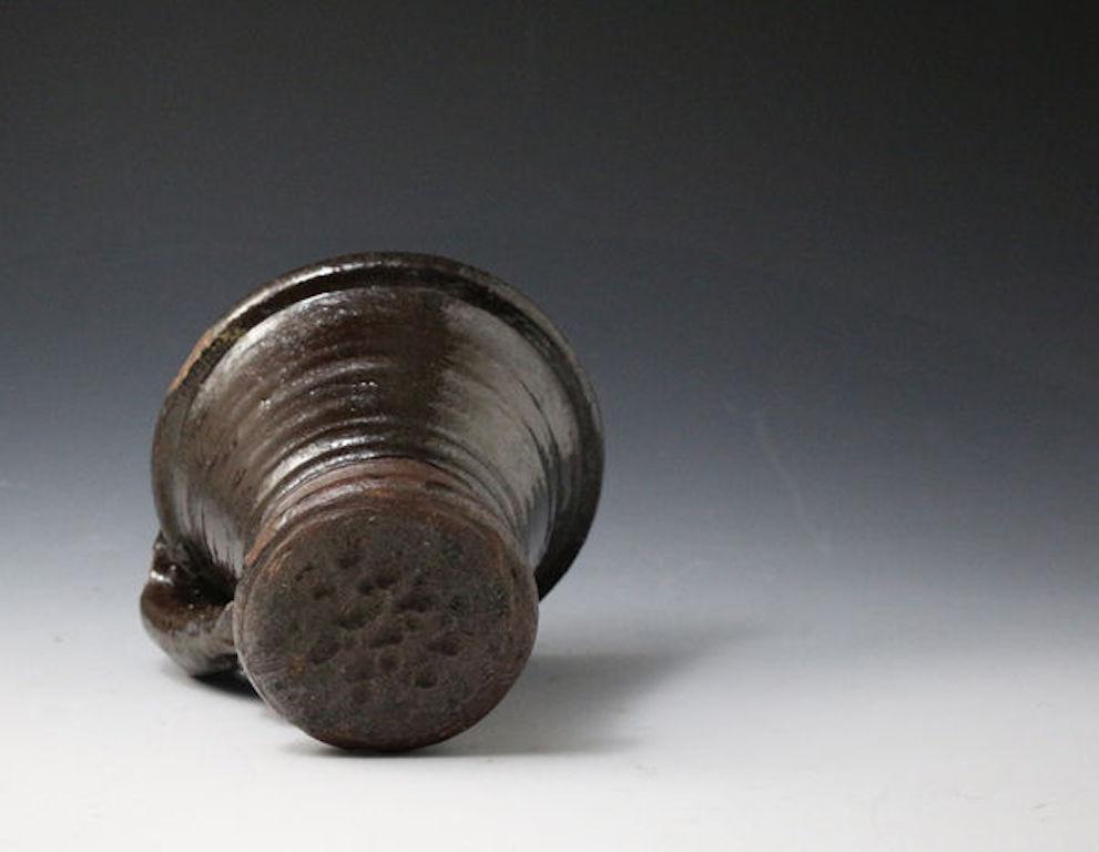 Mid-17th Century English Earthenware 17th Century Mortar the Handle with a Pinched Terminal For Sale