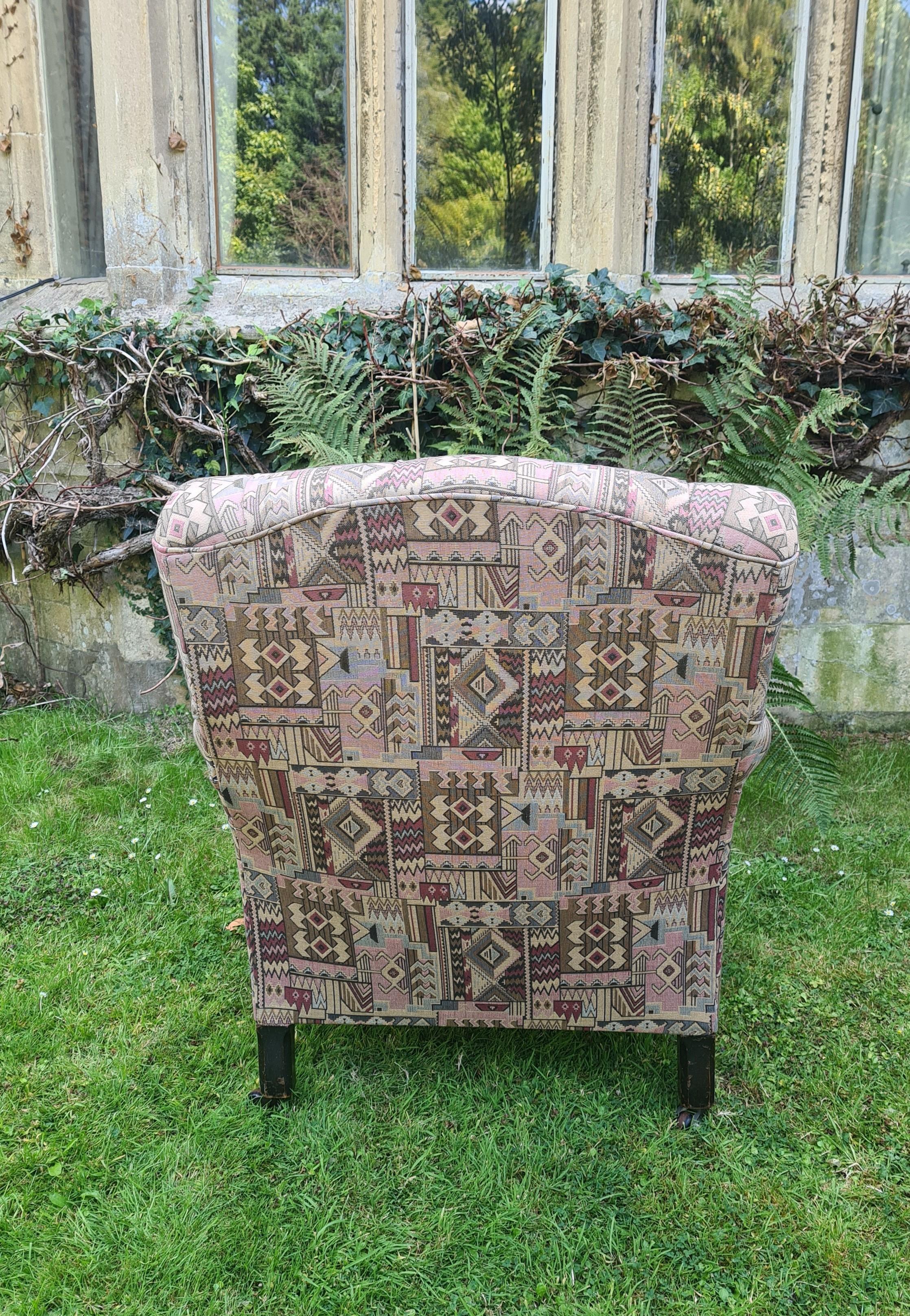 British English easy upholstered armchair For Sale