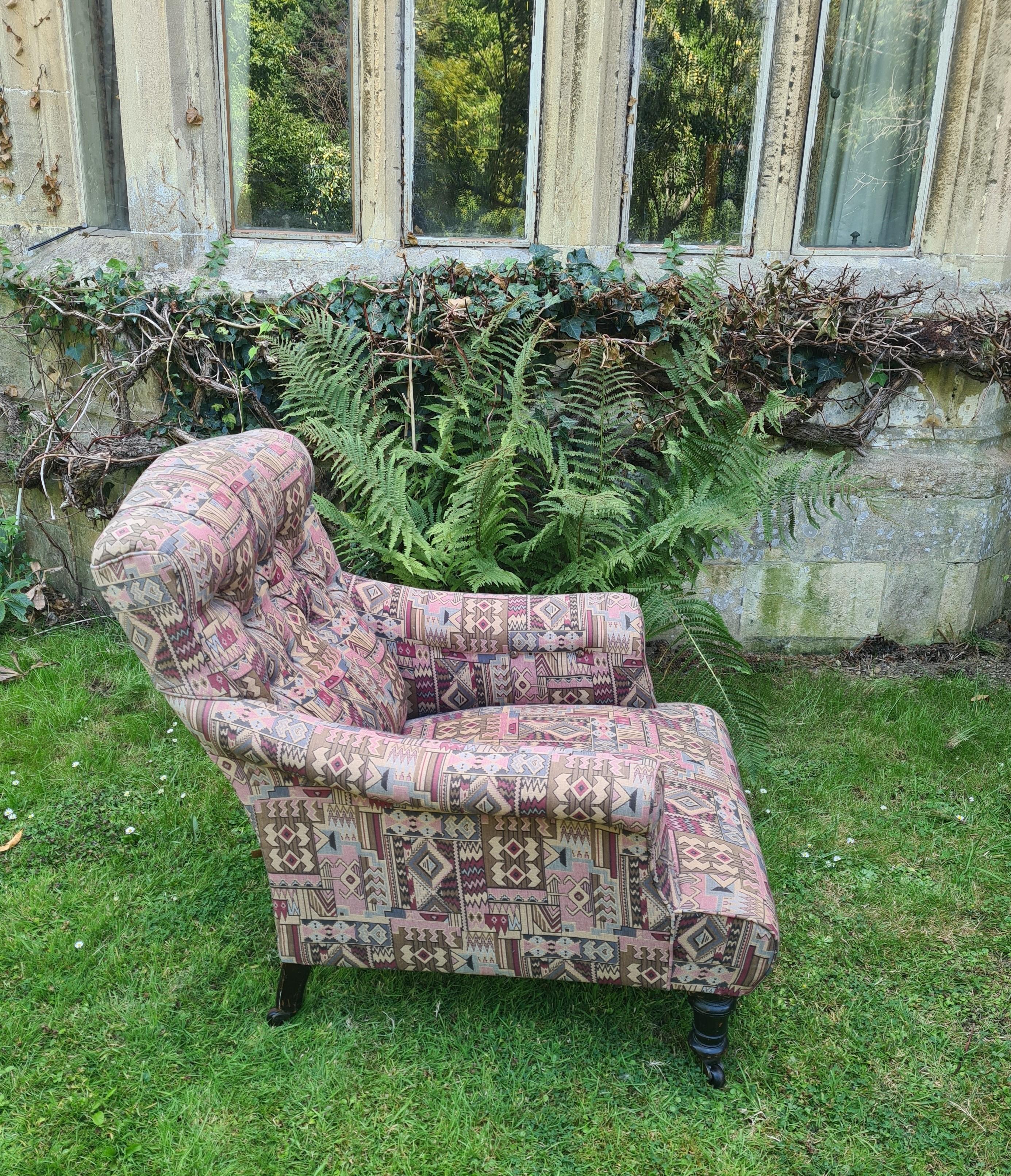 Turned English easy upholstered armchair For Sale