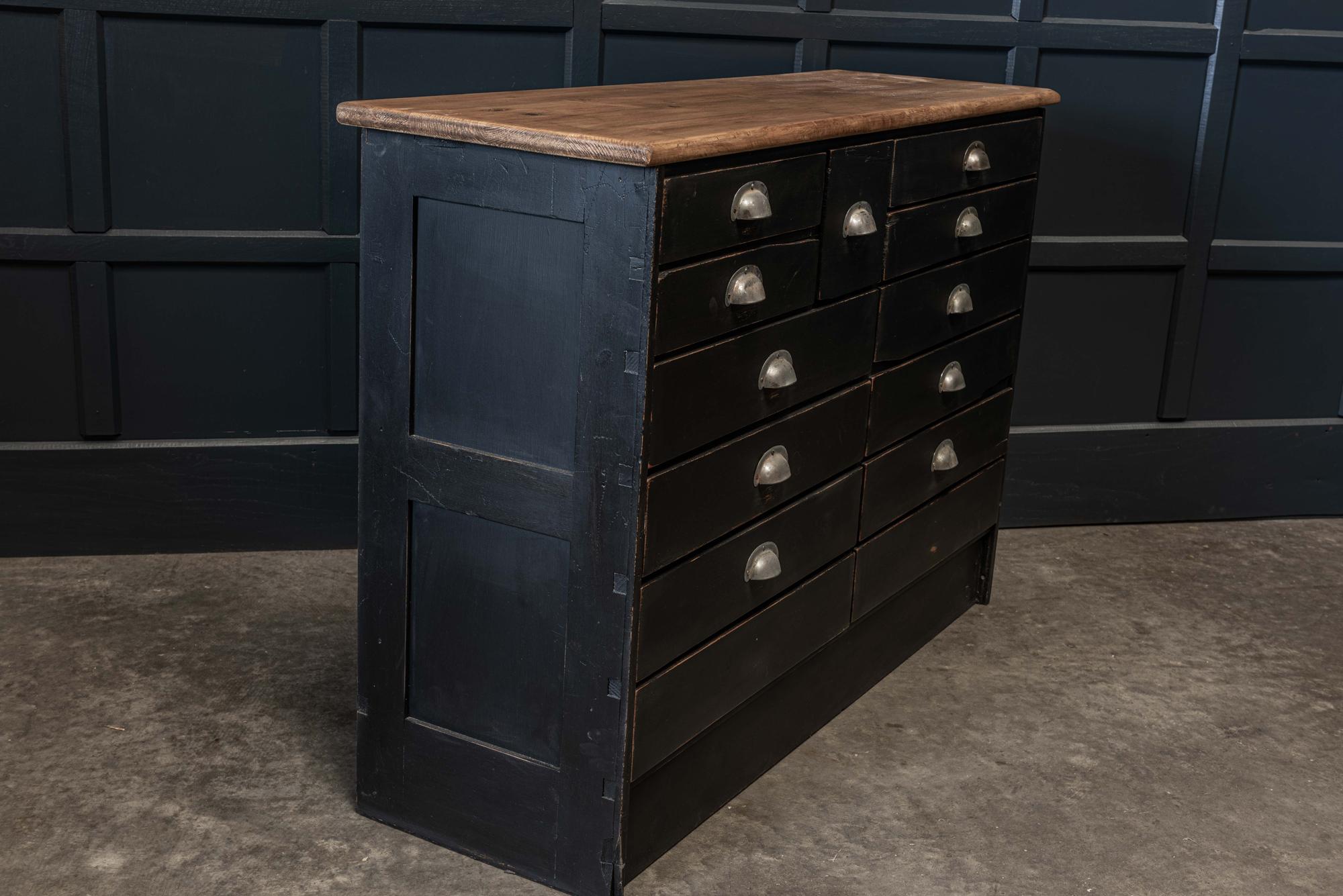 English ebonized haberdashery bank of 13 drawers,
circa 1930.

Bank of 13 drawers with paneled sides. Slim with a narrow depth makes it a versatile piece of furniture. Ideal in a kitchen, hall or bedroom.

Sku 421

Measures: W 130 x D 40 x H 89cm.