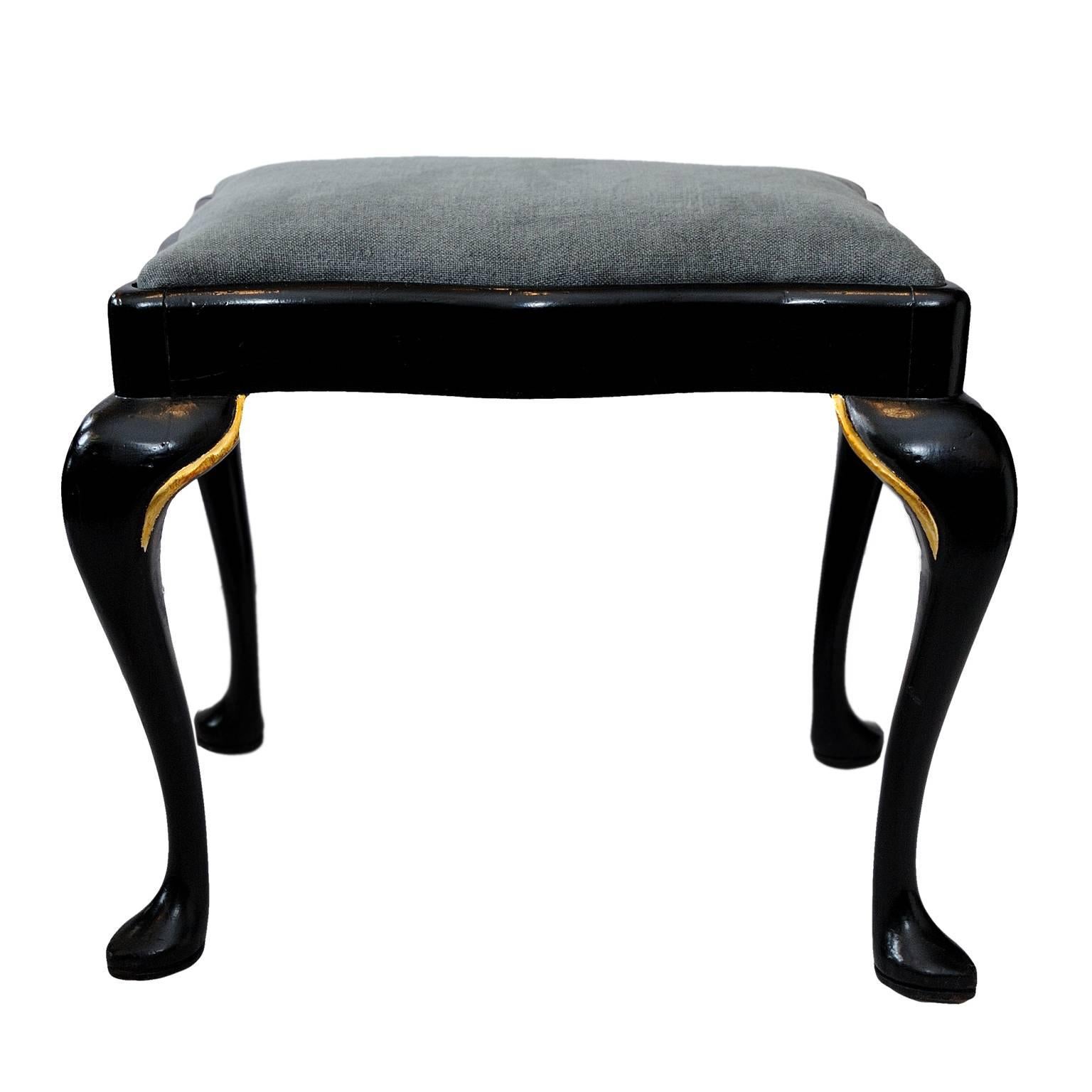 This is a rather lovely and rather stylish ebonised and gilt cabriole leg stool with serpentine rails and 'drop in' blue/grey covered seat, circa 1860.
  