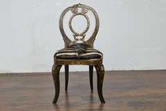 Sedia inglese ebanizzata con intarsi in madreperla e rivestimento in pelle di zebra