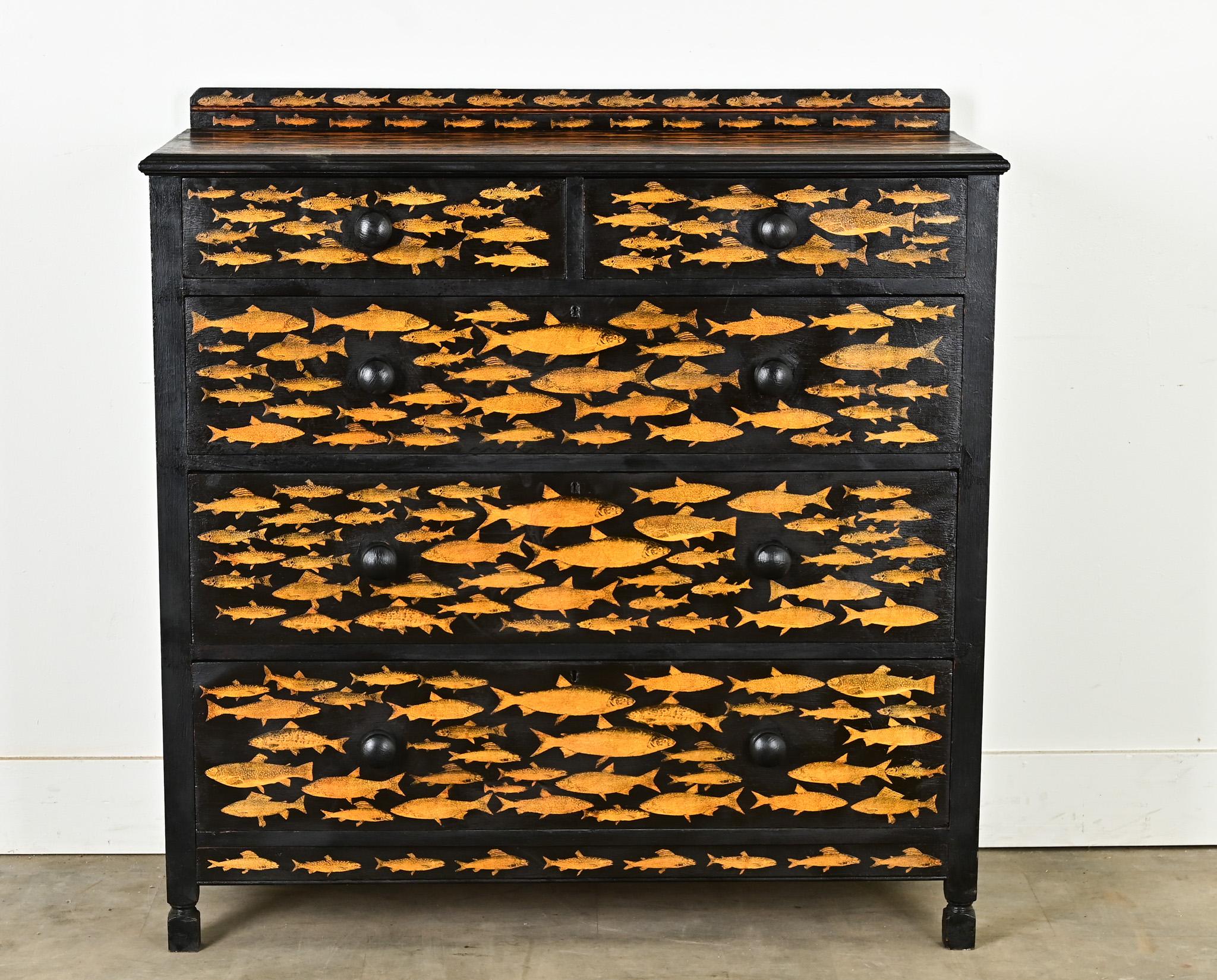 Recently updated with ebonizing and decoupage, this 1940s pine chest from England would be an entertaining addition to a beach or lake house, or child’s bedroom. Solid pine makes for sturdy construction of the case and five drawers with solid,