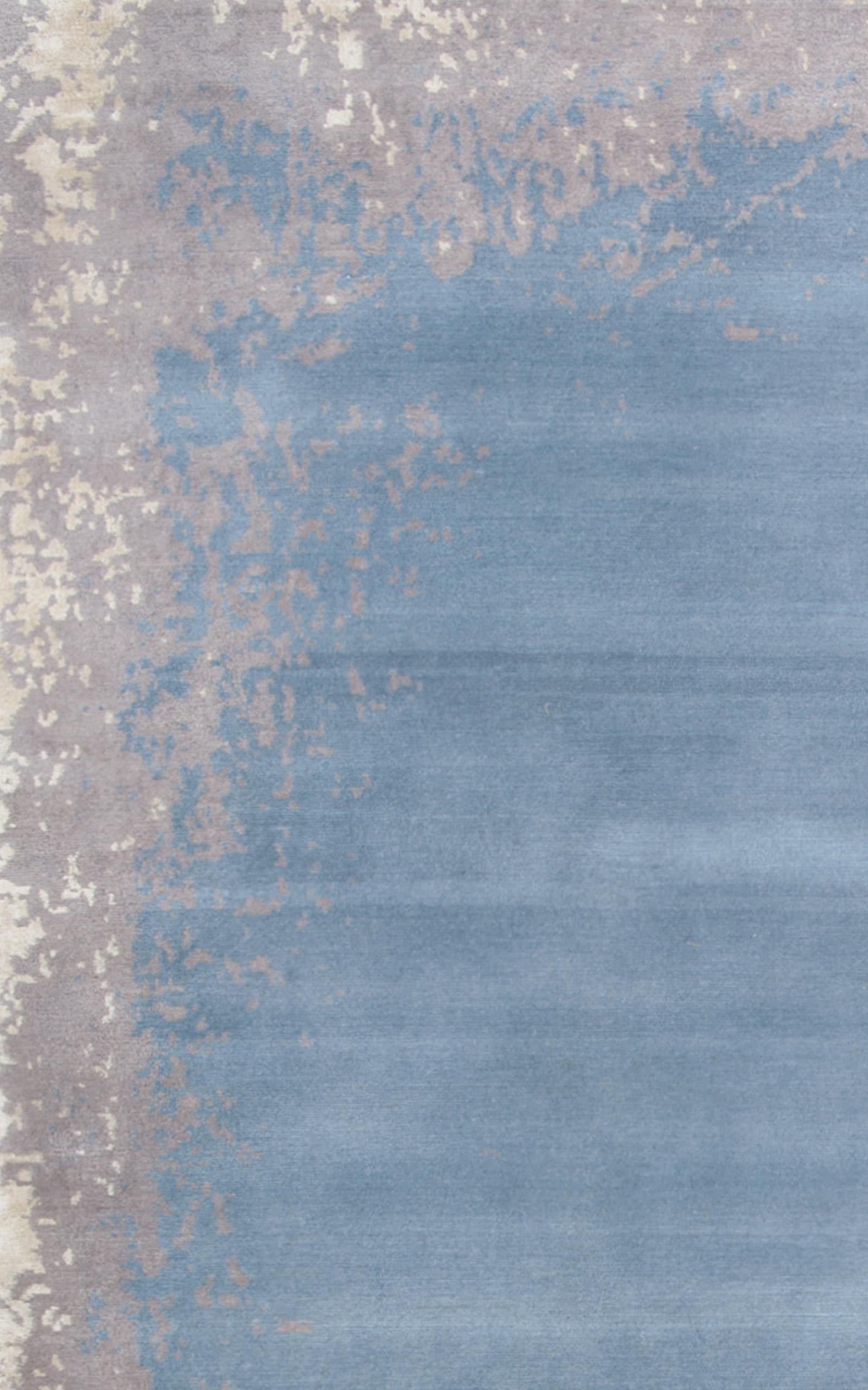 Modern Border in Dark Rain est un tapis abstrait à la fois simple et saisissant. Faisant partie de la collection English Eccentrics de Knots Rugs, Modern Border est notre propre interprétation de l'utilisation traditionnelle des bordures dans la