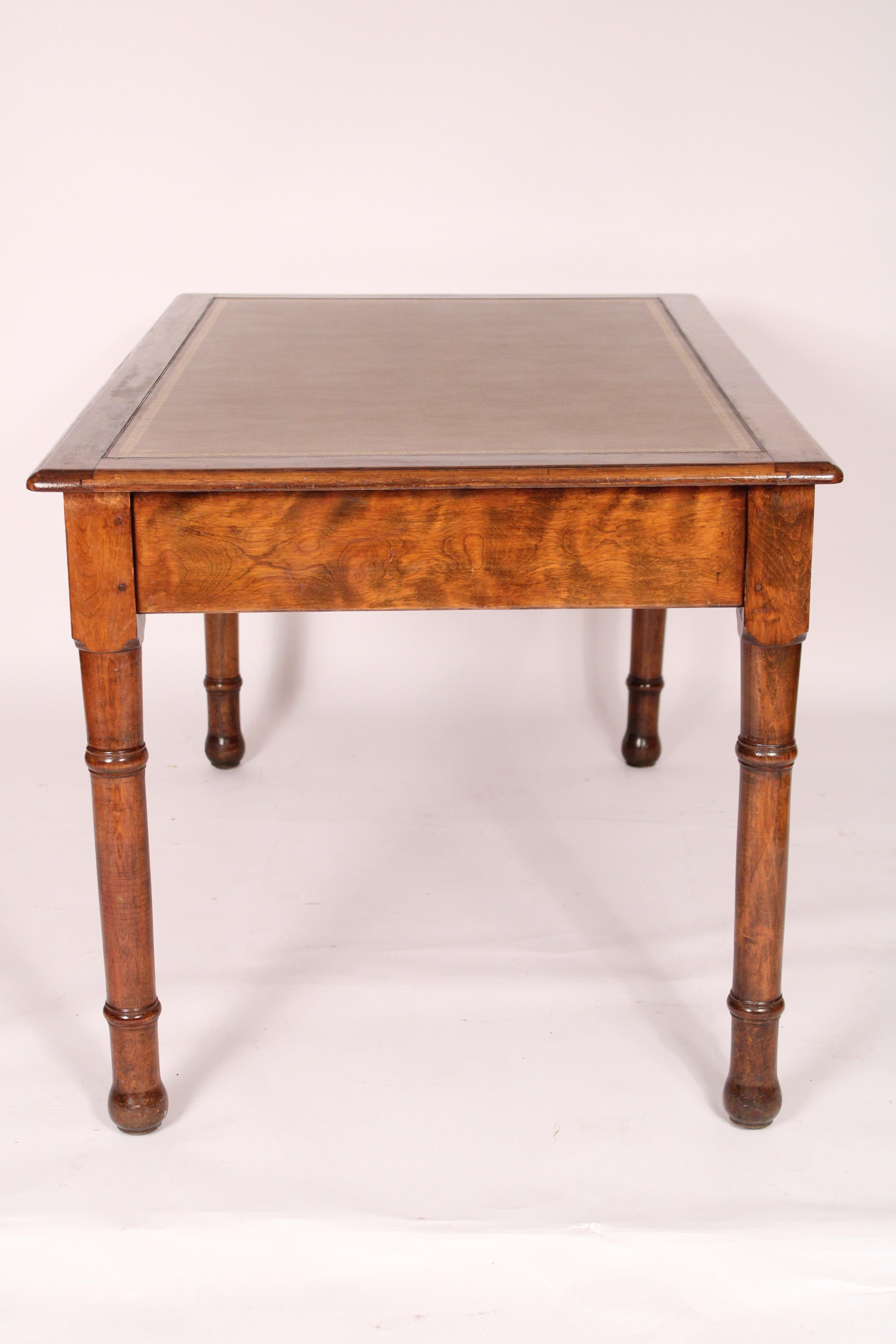 Early 20th Century English Edwardian Beechwood Writing Table with a Tooled Leather Top