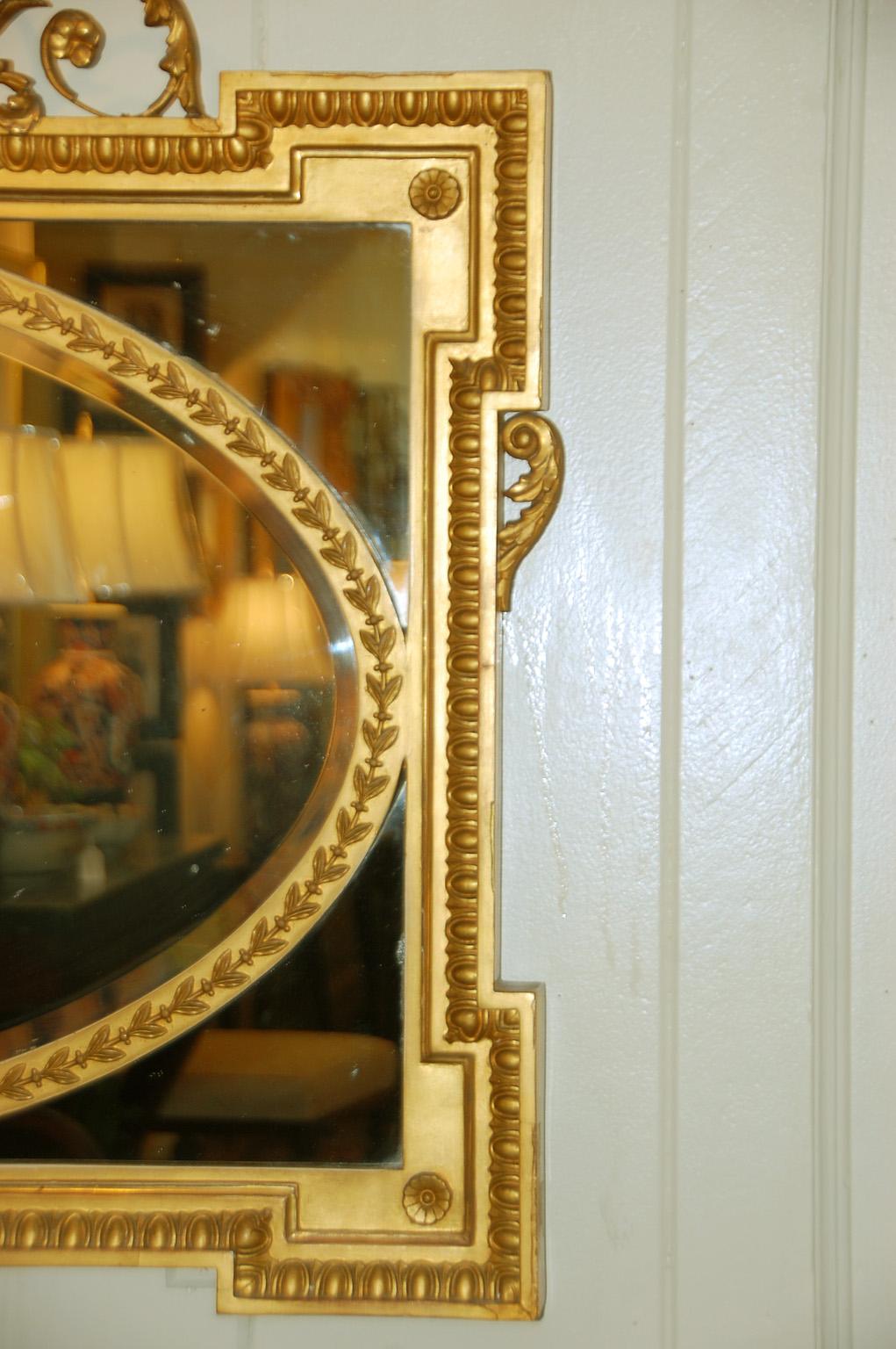 English Edwardian Gold Mirror with Urn and Trailing Leaves Surmounting the Frame In Good Condition For Sale In Wells, ME