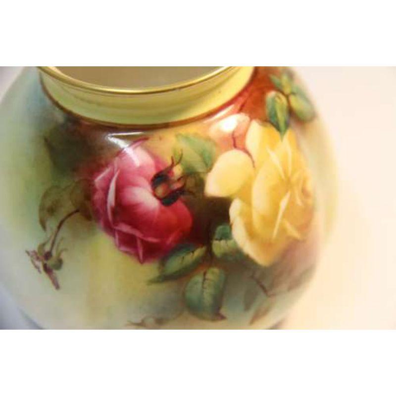 A Fine English Edwardian Hadley's Royal Worcester Porcelain Floral painted vase

This small superbly painted Hadley's Royal Worcester porcelain vase is a delightful piece. It is of a globular form with a shallow flared neck and a gilt rim. It is