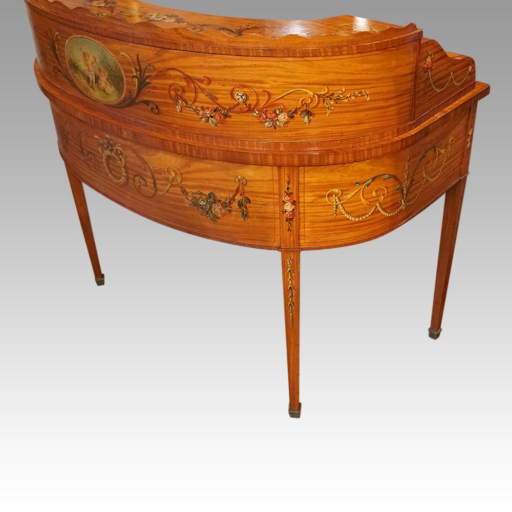 A most elegant Edwardian satinwood painted Carlton House desk, a piece that is bound to enhance your home.

This Edwardian satinwood hand-painted Carlton House desk was made circa 1900.

The Edwardian era is known as the age of elegance, this