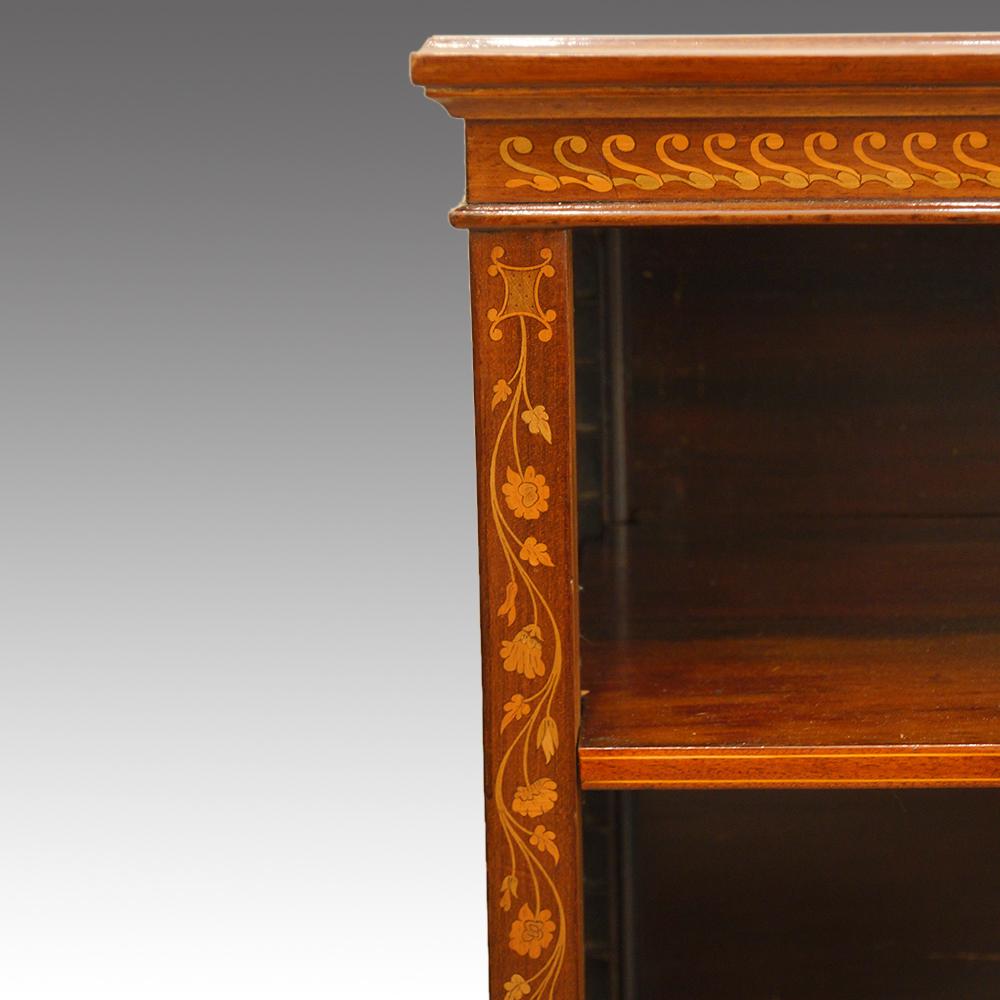 Edwardian inlaid mahogany open bookcase 
This Edwardian inlaid mahogany open bookcase was made circa 1900.
It is a lovely size that will fit all homes and can be used in many rooms around your home.
Having the box wood stringing and the unusual