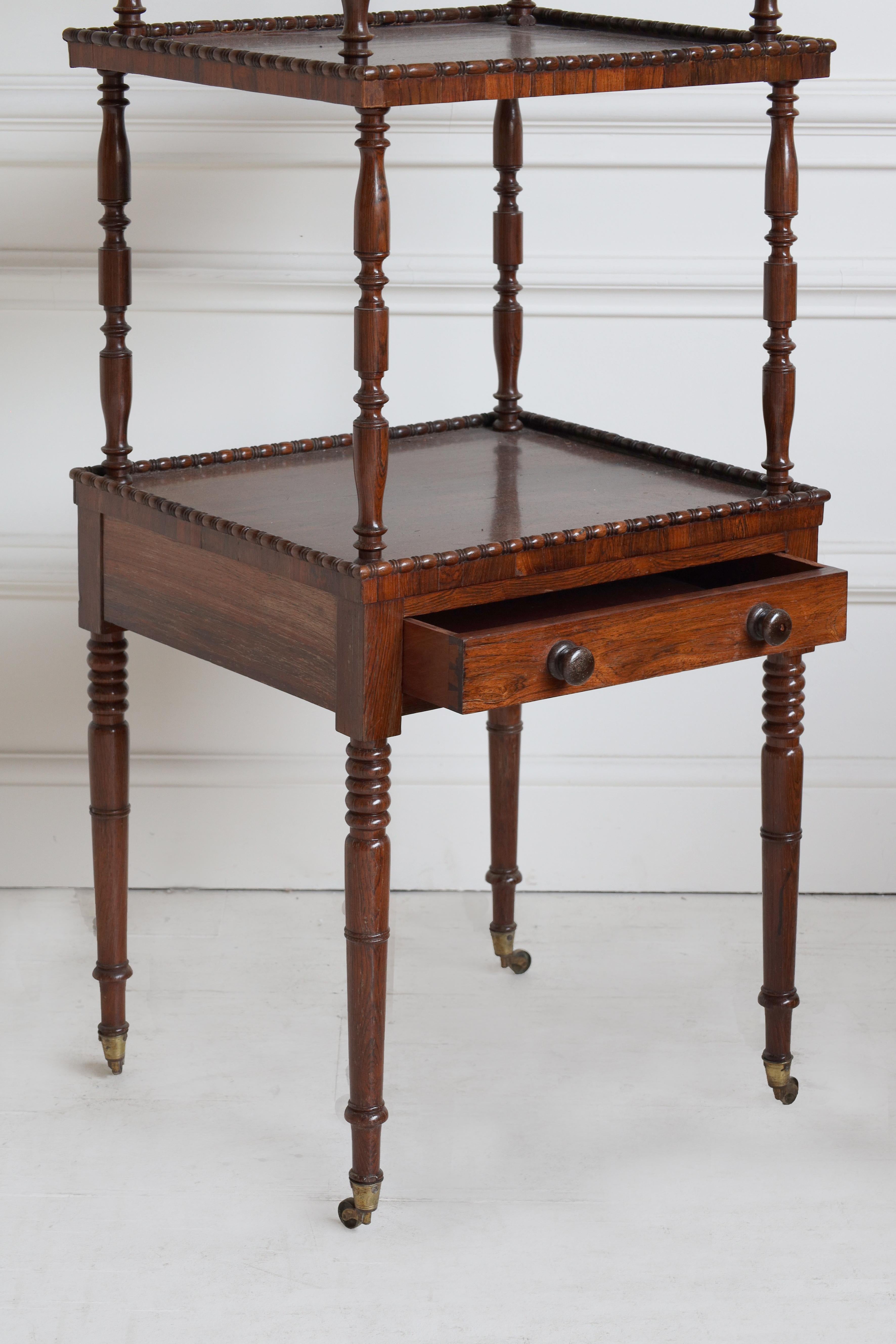 English Edwardian etagere in mahogany with three shelves.

