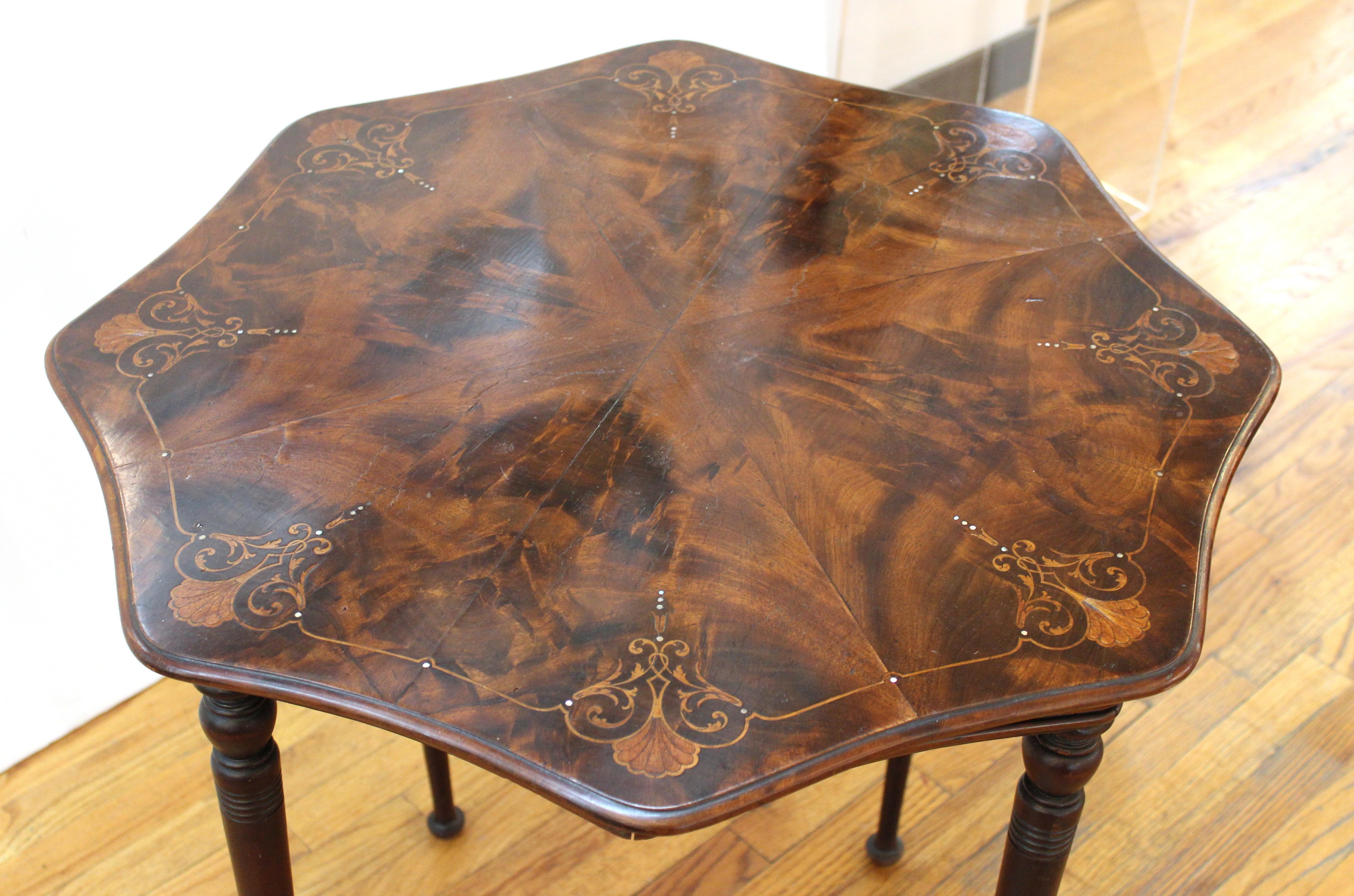 English Edwardian style parquetry center table or side table with mother of pearl inlay.