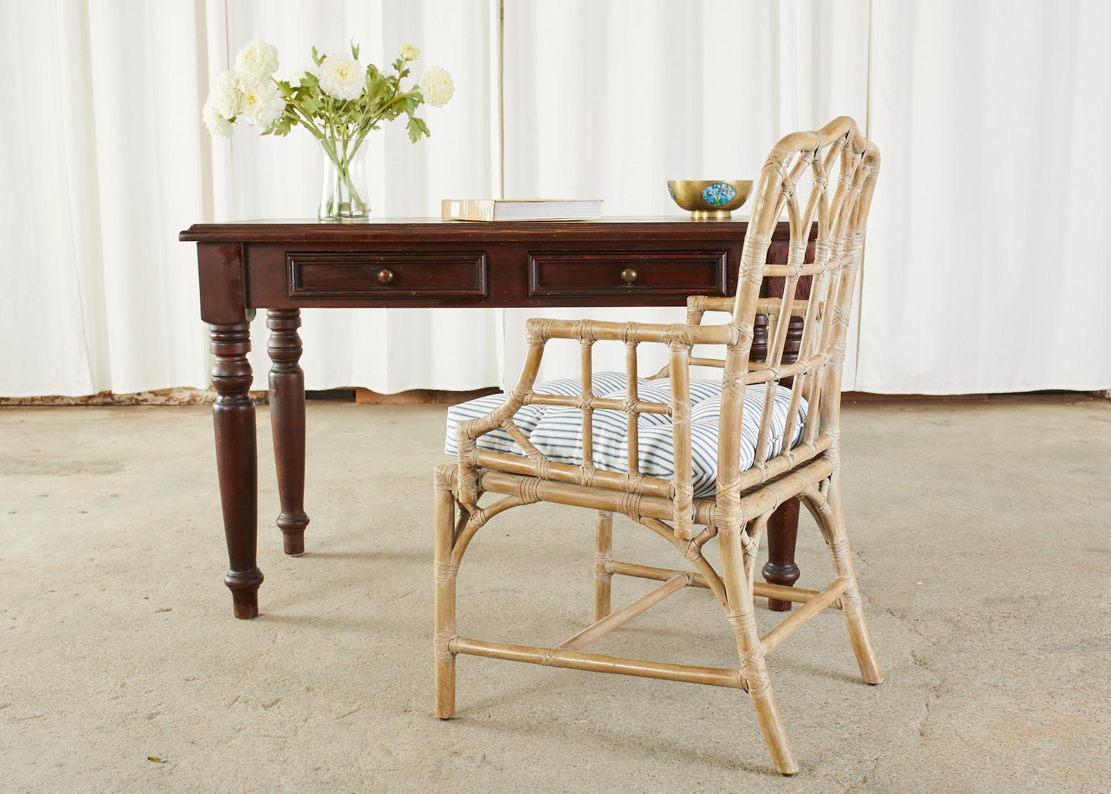 Rustic pine writing table or desk featuring thick turned legs. Made in the English Edwardian taste with a two drawer case. Finished in a dark stain on the pine. Ample leg room measuring 24 inches from the floor to the apron. From an estate in San