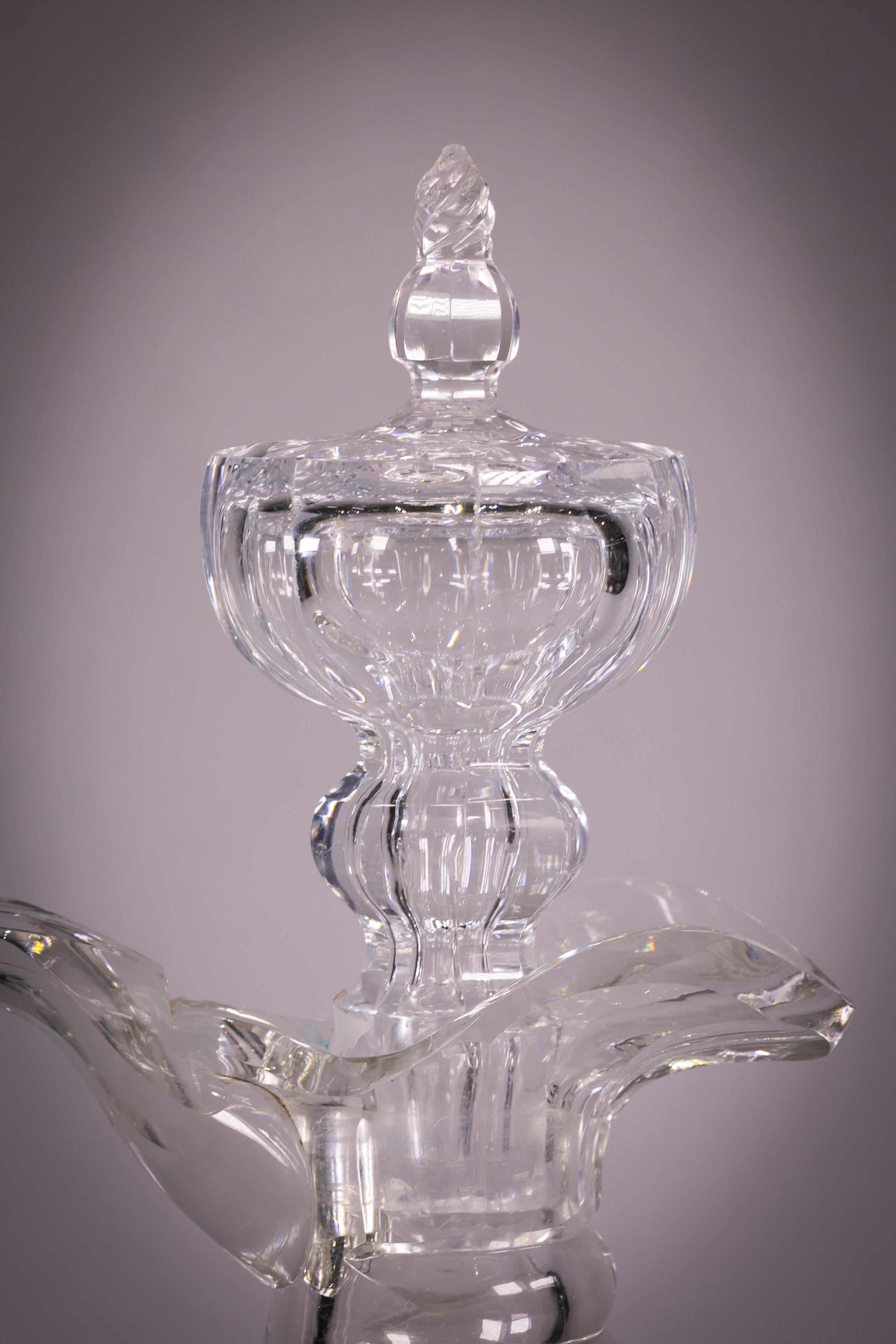 English elaborately cut and faceted stoppered crystal decanter, circa 1880. Very thick glass.
