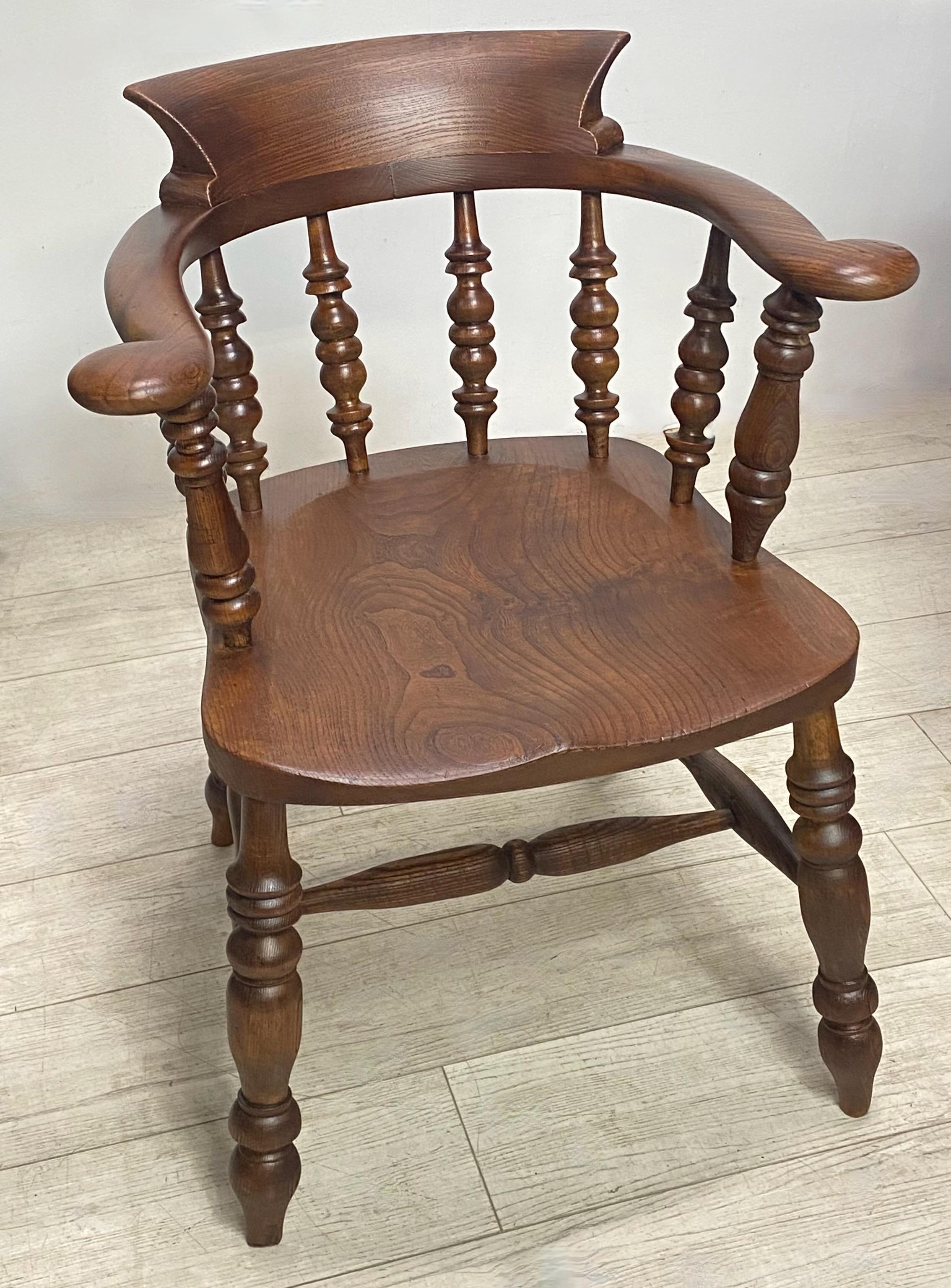 An early 19th century solid elm and oak Windsor style low back captain's chair.
Recently refinished and in excellent condition, sturdy and sound. 

 