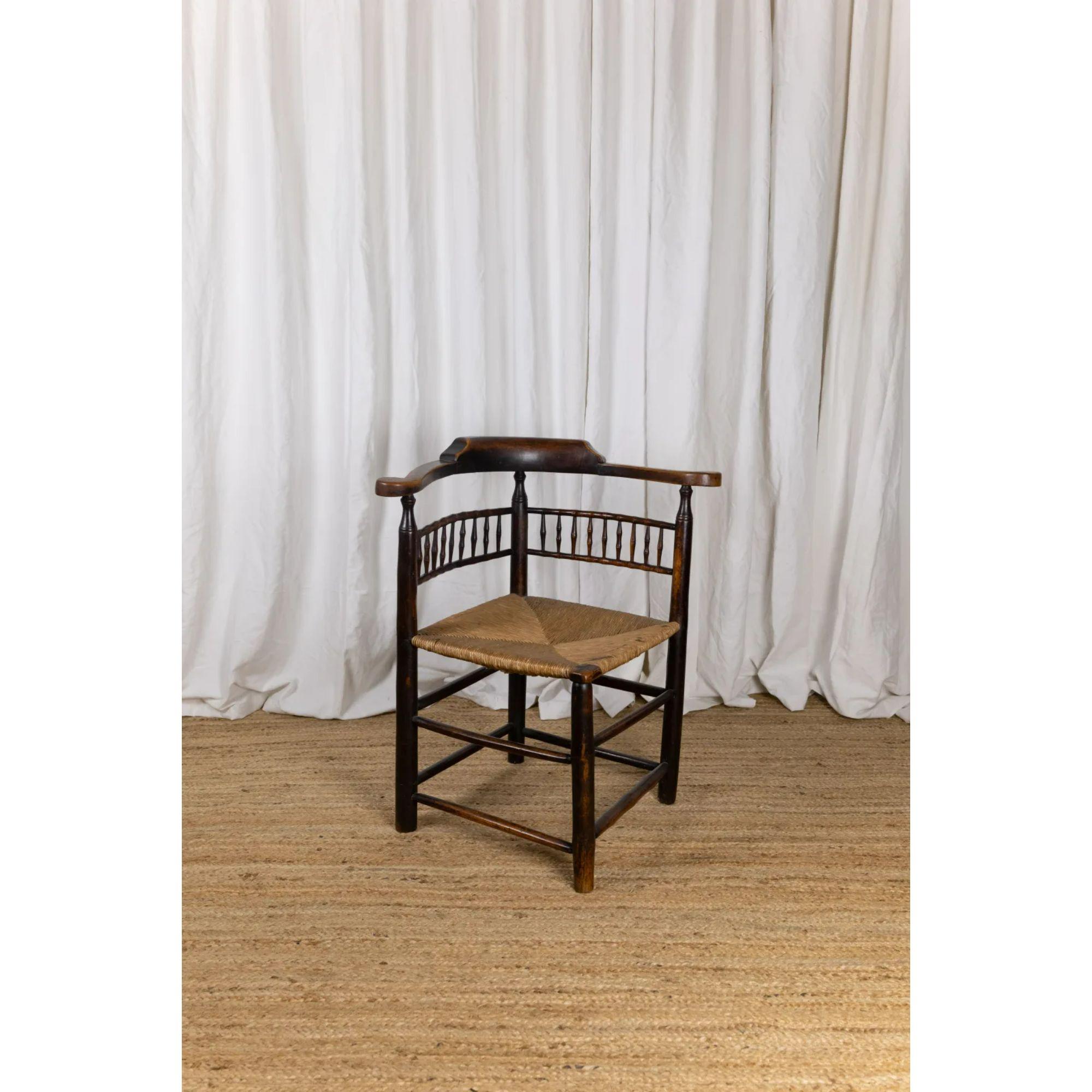 English Elm Corner chair, Early 19th Century

An early 19th Century corner chair made in elm with a rush seat and an unusual simulated bamboo details in the seat back.

A lovely example of a totally hand made country chair with a deep overall